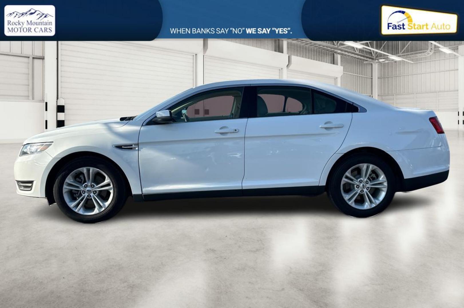 2016 White Ford Taurus SEL FWD (1FAHP2E83GG) with an 3.5L V6 DOHC 24V engine, 6A transmission, located at 344 S Washington Blvd, Ogden, UT, 84404, (801) 399-1799, 41.255482, -111.970848 - Photo#6