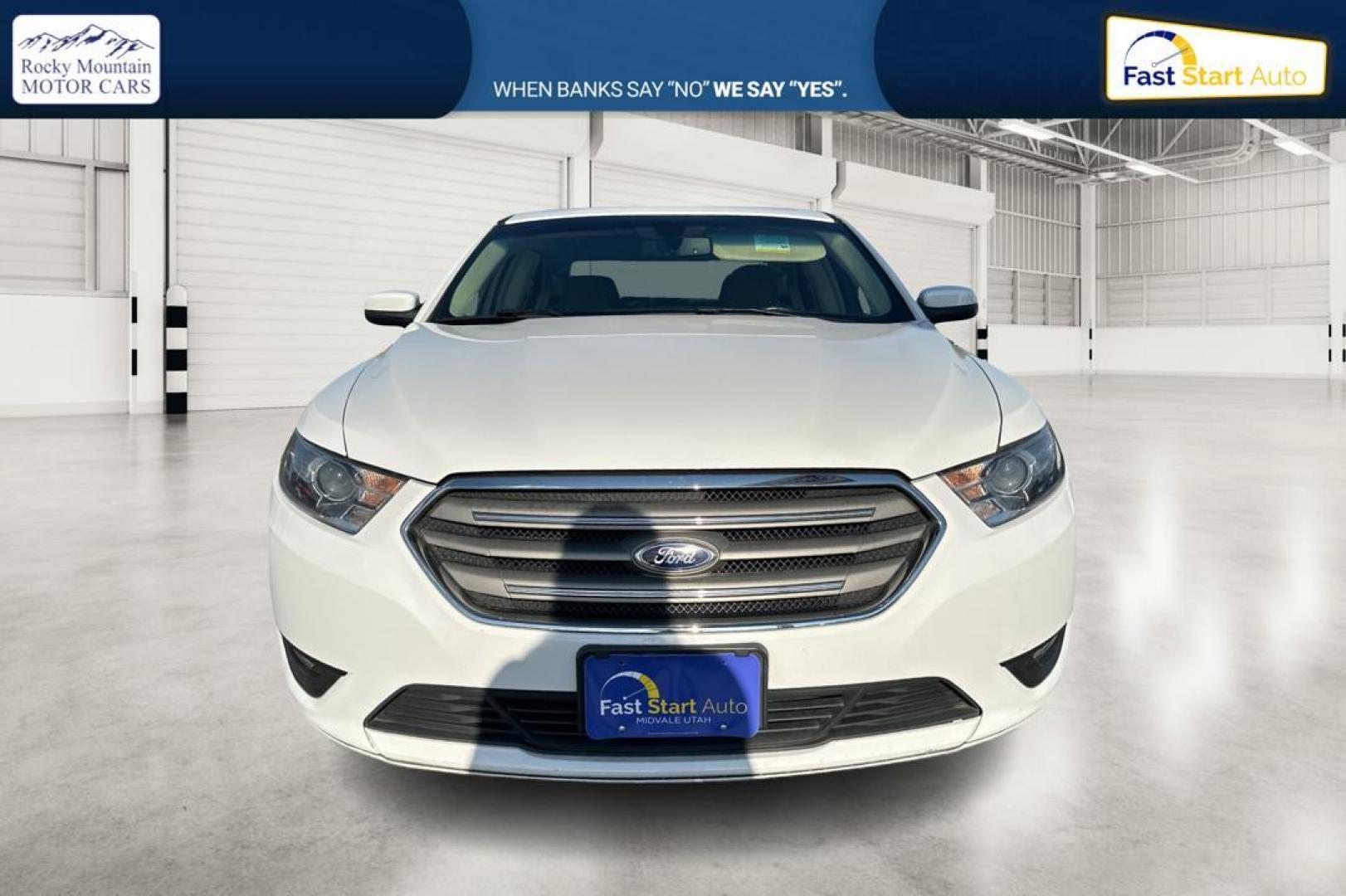 2016 White Ford Taurus SEL FWD (1FAHP2E83GG) with an 3.5L V6 DOHC 24V engine, 6A transmission, located at 344 S Washington Blvd, Ogden, UT, 84404, (801) 399-1799, 41.255482, -111.970848 - Photo#9