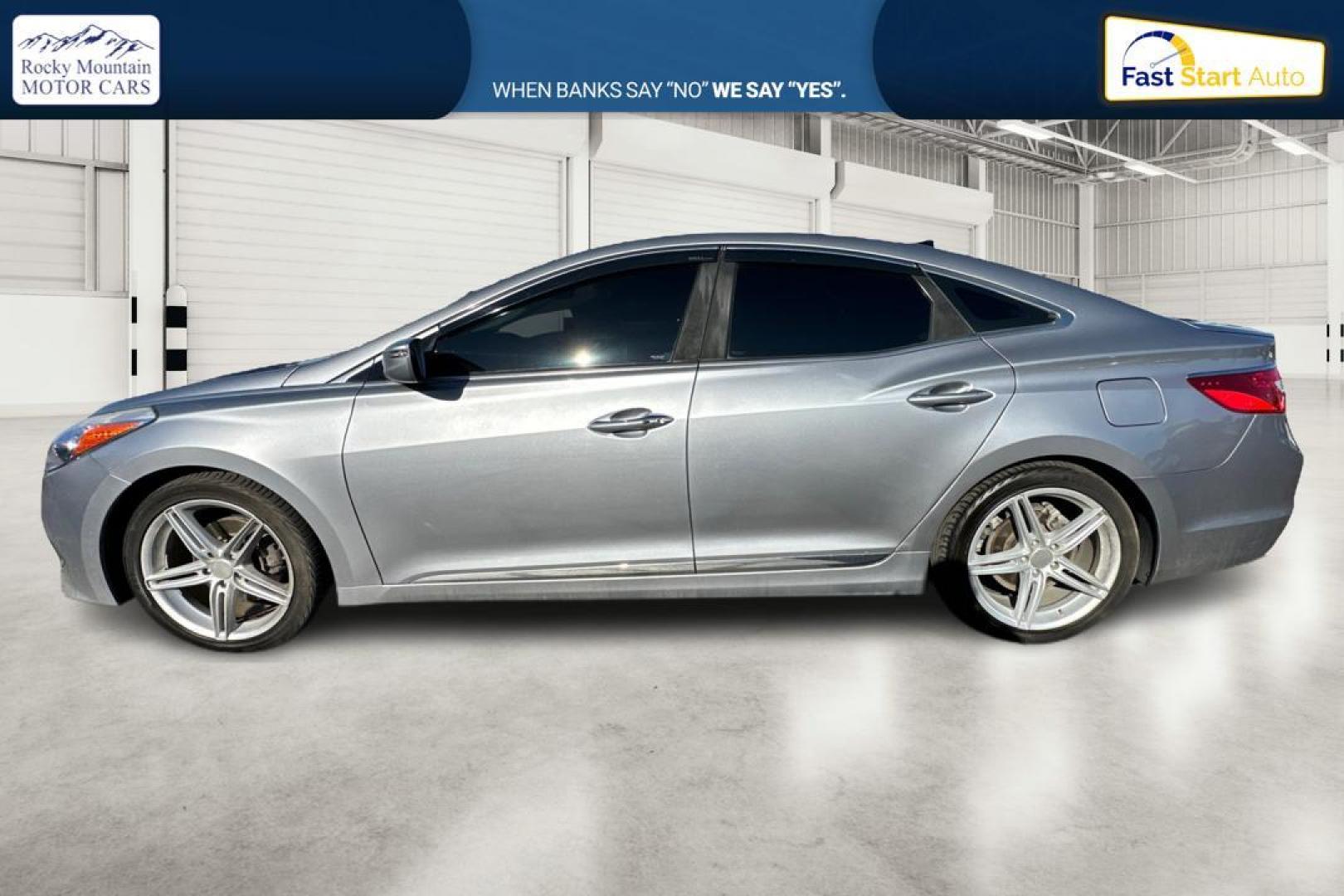 2016 Gray Hyundai Azera Limited (KMHFH4JG3GA) with an 3.3L V6 DOHC 24V engine, 6A transmission, located at 344 S Washington Blvd, Ogden, UT, 84404, (801) 399-1799, 41.255482, -111.970848 - Photo#6