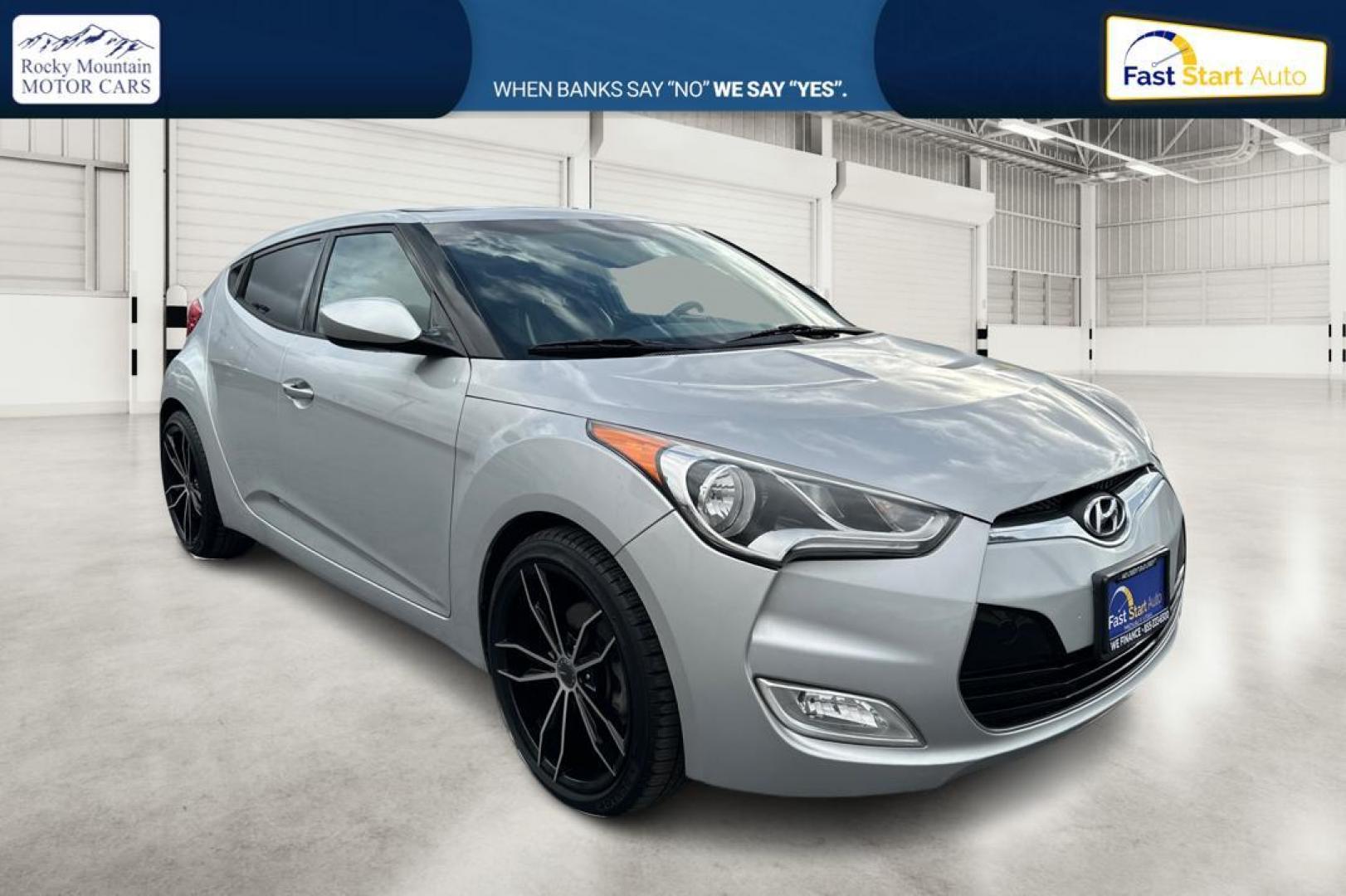 2016 Silver Hyundai Veloster Base 6MT (KMHTC6AD6GU) with an 1.6L L4 DOHC 16V engine, 6-Speed Manual transmission, located at 7755 State Street, Midvale, UT, 84047, (801) 753-9063, 40.610329, -111.892159 - Photo#0