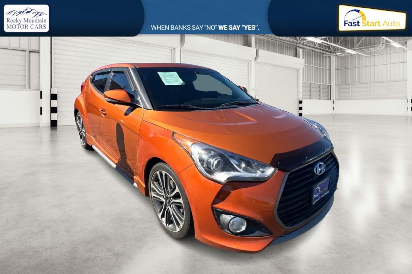 2016 Orange Hyundai Veloster Turbo 6MT (KMHTC6AE4GU) with an 1.6L L4 DOHC 16V TURBO engine, 6M transmission, located at 7755 State Street, Midvale, UT, 84047, (801) 753-9063, 40.610329, -111.892159 - Photo#0