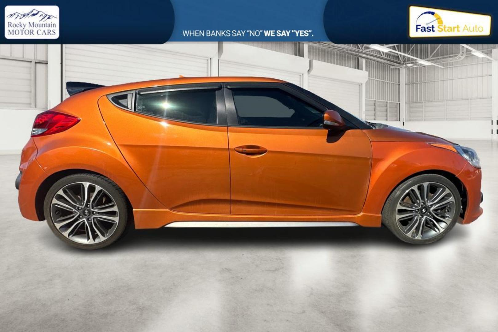 2016 Orange Hyundai Veloster Turbo 6MT (KMHTC6AE4GU) with an 1.6L L4 DOHC 16V TURBO engine, 6M transmission, located at 7755 State Street, Midvale, UT, 84047, (801) 753-9063, 40.610329, -111.892159 - Photo#1