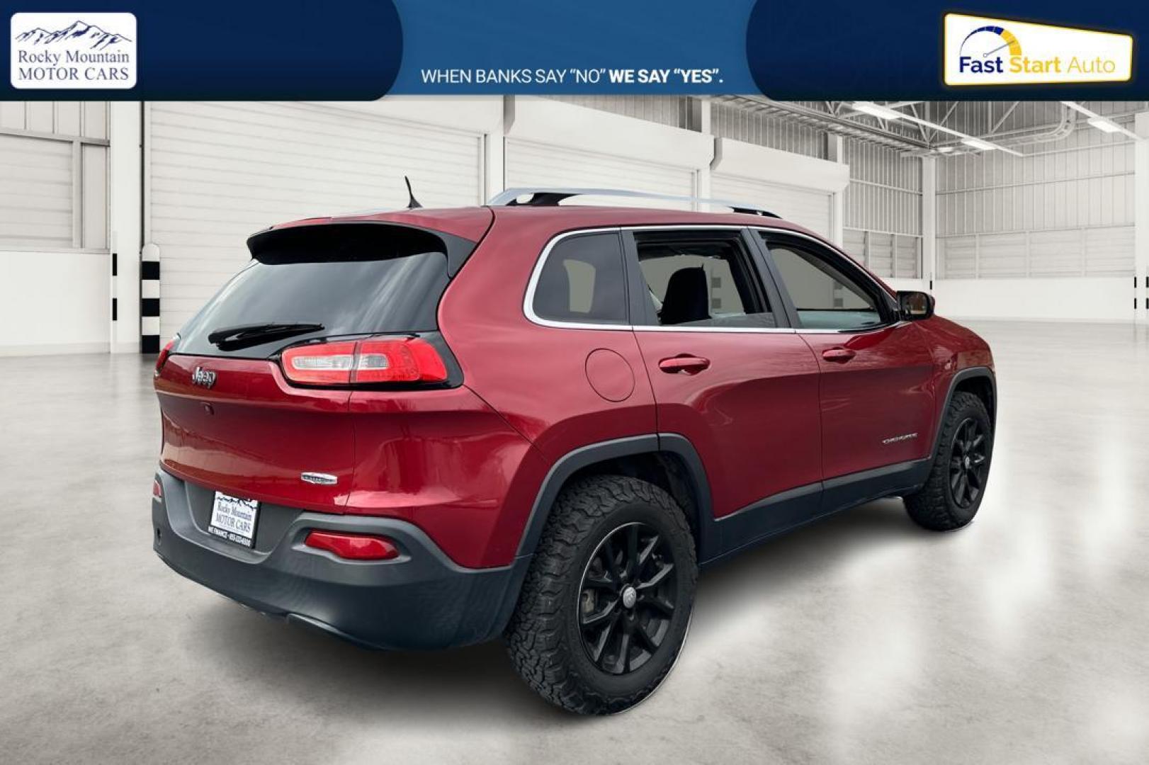 2016 Red Jeep Cherokee Latitude FWD (1C4PJLCB1GW) with an 2.4L L4 DOHC 16V engine, 9A transmission, located at 767 S State Road, Pleasant Grove, UT, 84062, (801) 785-1058, 40.354839, -111.736687 - Photo#2