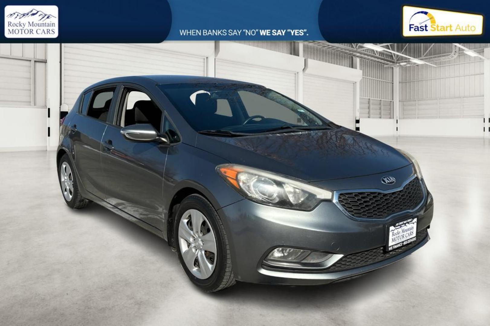 2016 Gray Kia Forte 5-Door LX (KNAFK5A87G5) with an 2.0L L4 DOHC 16V engine, 6-Speed Automatic transmission, located at 767 S State Road, Pleasant Grove, UT, 84062, (801) 785-1058, 40.354839, -111.736687 - Photo#0