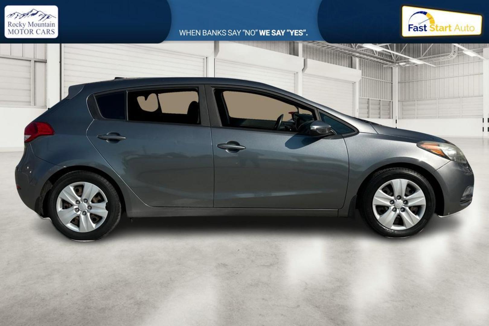 2016 Gray Kia Forte 5-Door LX (KNAFK5A87G5) with an 2.0L L4 DOHC 16V engine, 6-Speed Automatic transmission, located at 767 S State Road, Pleasant Grove, UT, 84062, (801) 785-1058, 40.354839, -111.736687 - Photo#1