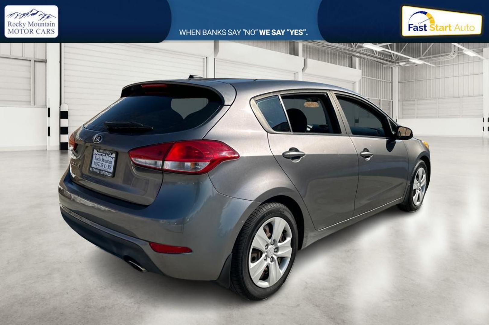 2016 Gray Kia Forte 5-Door LX (KNAFK5A87G5) with an 2.0L L4 DOHC 16V engine, 6-Speed Automatic transmission, located at 767 S State Road, Pleasant Grove, UT, 84062, (801) 785-1058, 40.354839, -111.736687 - Photo#2