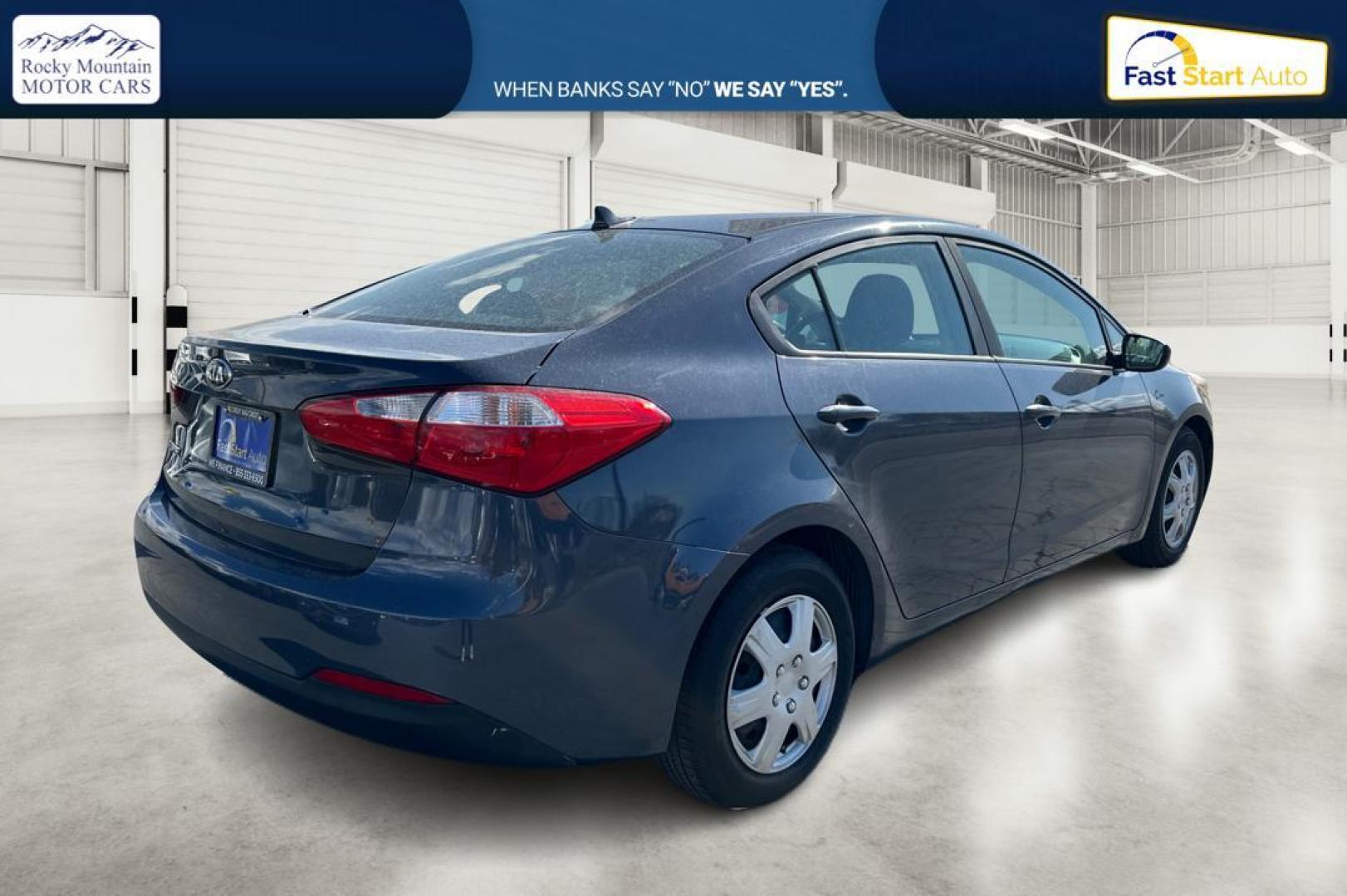 2016 Blue Kia Forte LX w/Popular Package (KNAFK4A66G5) with an 1.8L L4 DOHC 16V engine, Auto, 6-Spd w/Sportmatic and Active ECO System transmission, located at 344 S Washington Blvd, Ogden, UT, 84404, (801) 399-1799, 41.255482, -111.970848 - Photo#2