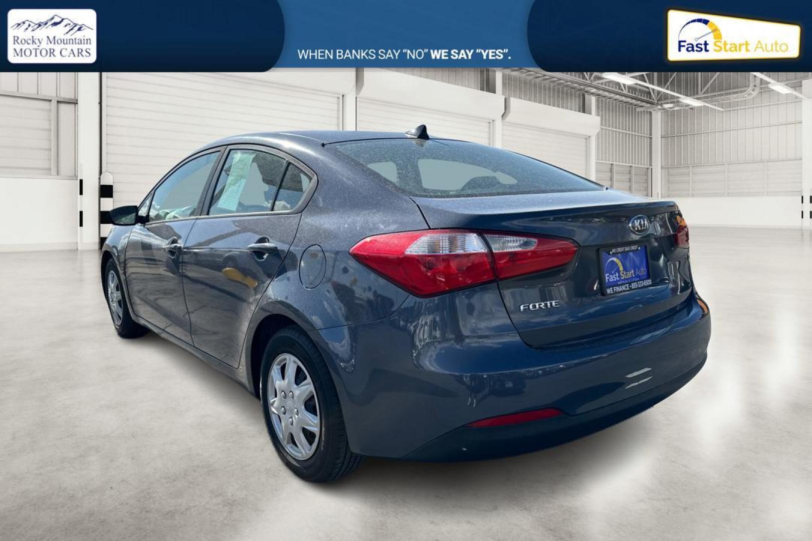 2016 Blue Kia Forte LX w/Popular Package (KNAFK4A66G5) with an 1.8L L4 DOHC 16V engine, Auto, 6-Spd w/Sportmatic and Active ECO System transmission, located at 344 S Washington Blvd, Ogden, UT, 84404, (801) 399-1799, 41.255482, -111.970848 - Photo#5