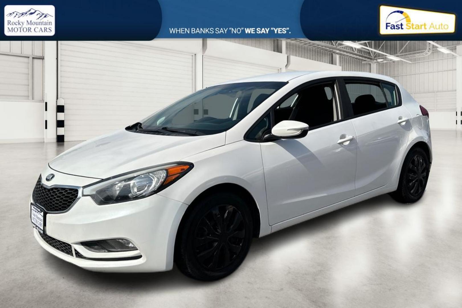 2016 White Kia Forte 5-Door LX (KNAFK5A84G5) with an 2.0L L4 DOHC 16V engine, 6-Speed Automatic transmission, located at 344 S Washington Blvd, Ogden, UT, 84404, (801) 399-1799, 41.255482, -111.970848 - Photo#8