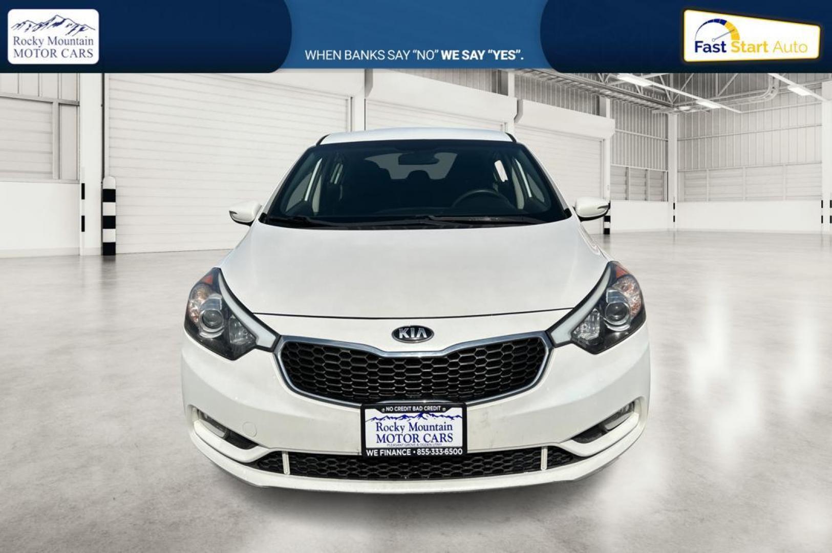 2016 White Kia Forte 5-Door LX (KNAFK5A84G5) with an 2.0L L4 DOHC 16V engine, 6-Speed Automatic transmission, located at 344 S Washington Blvd, Ogden, UT, 84404, (801) 399-1799, 41.255482, -111.970848 - Photo#9