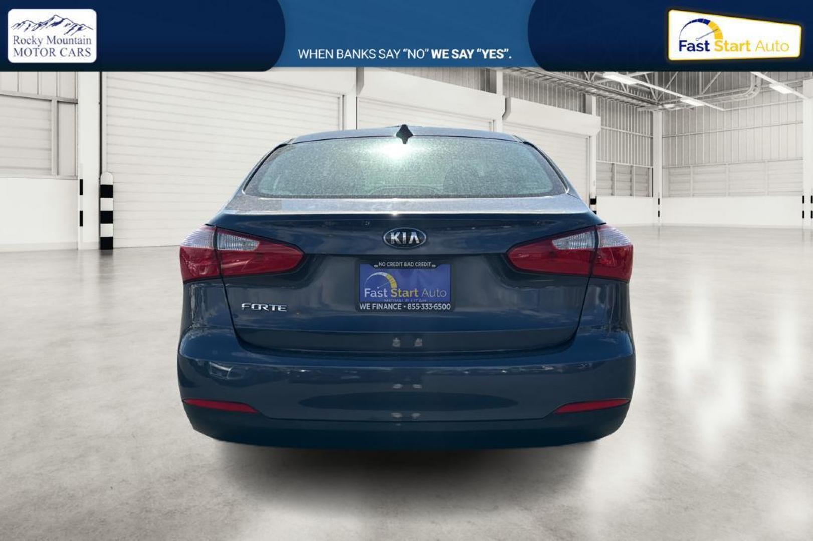 2016 Blue Kia Forte LX w/Popular Package (KNAFK4A66G5) with an 1.8L L4 DOHC 16V engine, Auto, 6-Spd w/Sportmatic and Active ECO System transmission, located at 767 S State Road, Pleasant Grove, UT, 84062, (801) 785-1058, 40.354839, -111.736687 - Photo#4