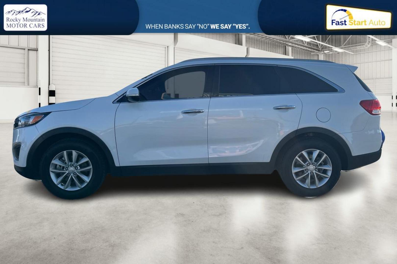 2016 White Kia Sorento LX 2WD (5XYPG4A32GG) with an 2.4L L4 DOHC 16V engine, 6-Speed Automatic transmission, located at 7755 State Street, Midvale, UT, 84047, (801) 753-9063, 40.610329, -111.892159 - Photo#6