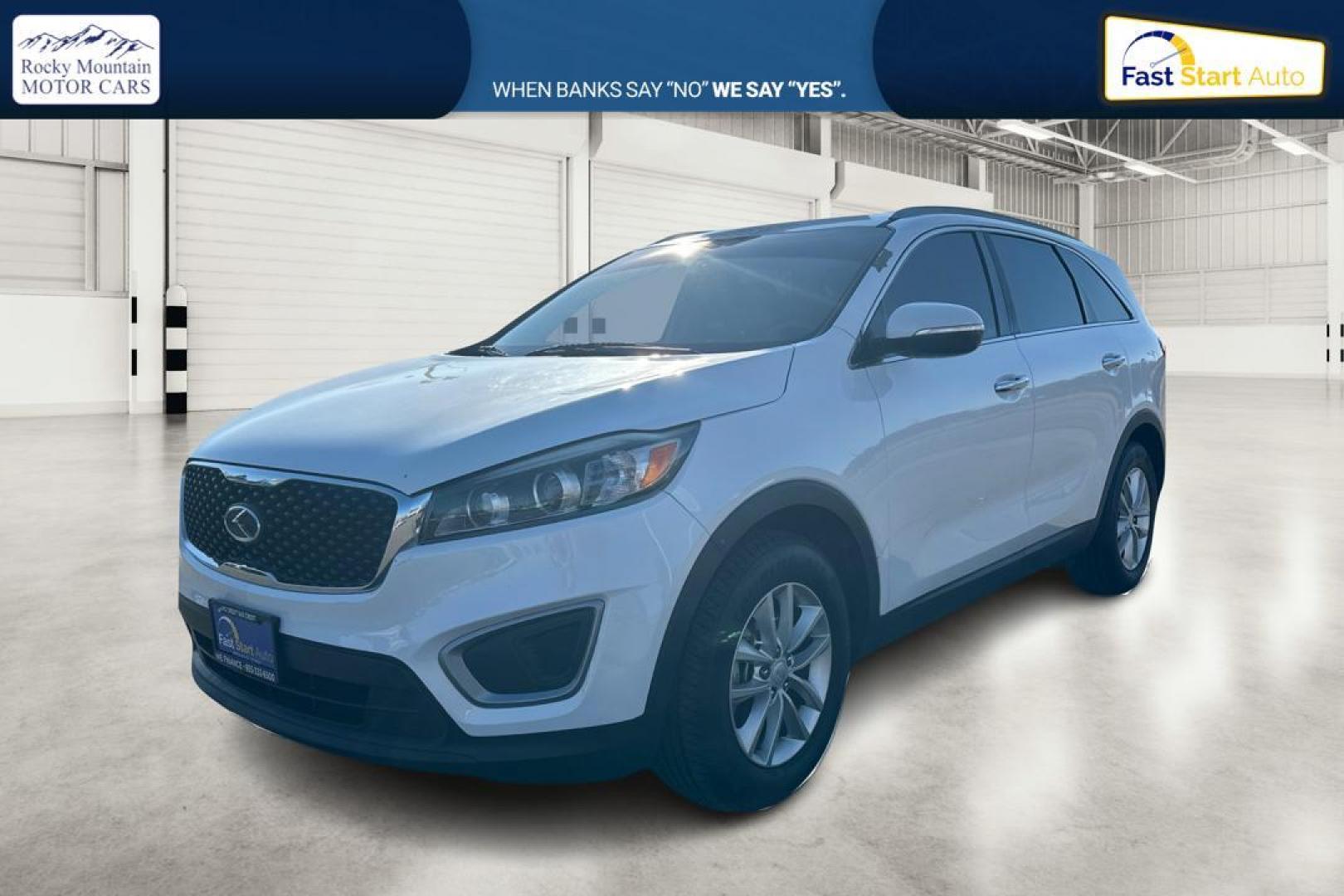 2016 White Kia Sorento LX 2WD (5XYPG4A32GG) with an 2.4L L4 DOHC 16V engine, 6-Speed Automatic transmission, located at 7755 State Street, Midvale, UT, 84047, (801) 753-9063, 40.610329, -111.892159 - Photo#8