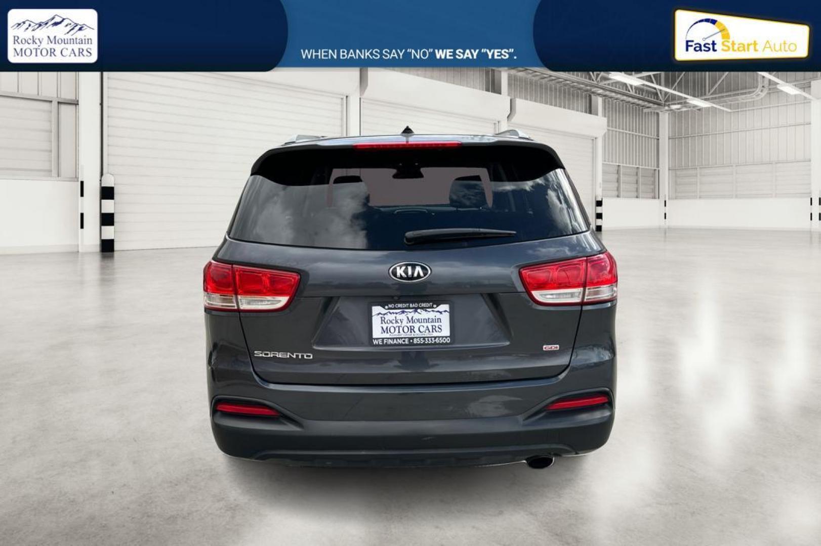 2016 Gray Kia Sorento LX 2WD (5XYPG4A32GG) with an 2.4L L4 DOHC 16V engine, 6-Speed Automatic transmission, located at 344 S Washington Blvd, Ogden, UT, 84404, (801) 399-1799, 41.255482, -111.970848 - Photo#4