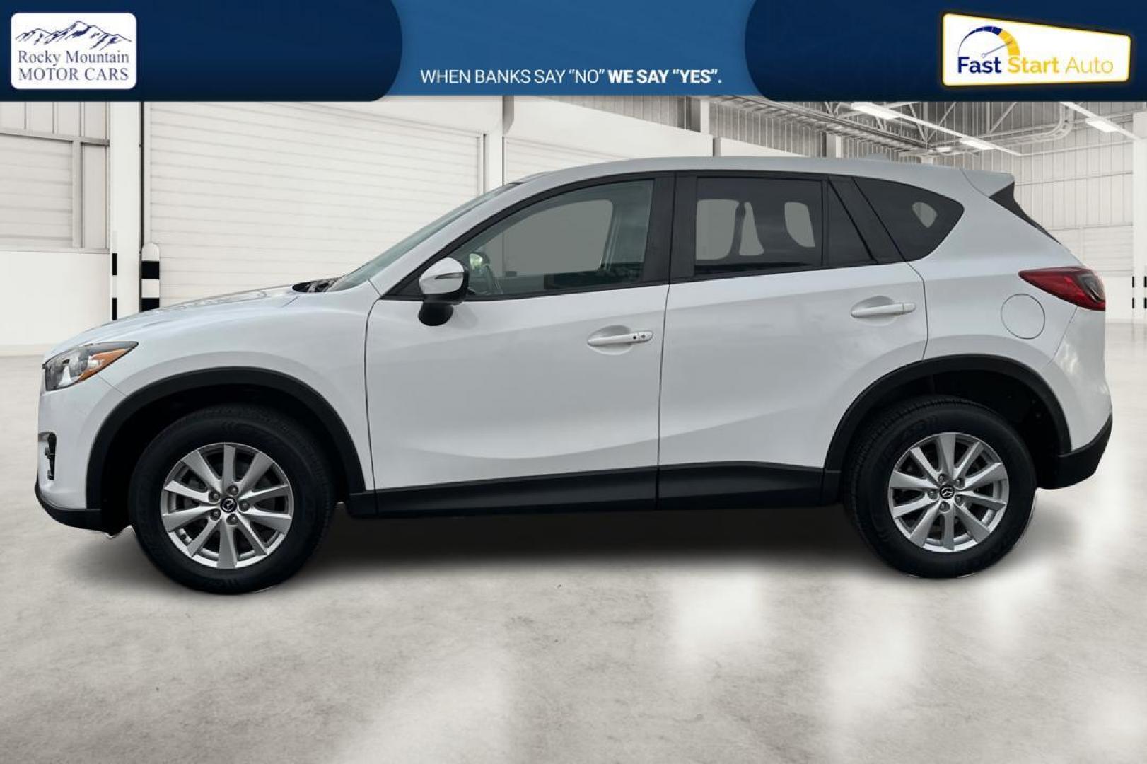 2016 White Mazda CX-5 Touring (JM3KE2CY5G0) with an 2.5L L4 DOHC 16V engine, 6-Speed Automatic transmission, located at 767 S State Road, Pleasant Grove, UT, 84062, (801) 785-1058, 40.354839, -111.736687 - Photo#6