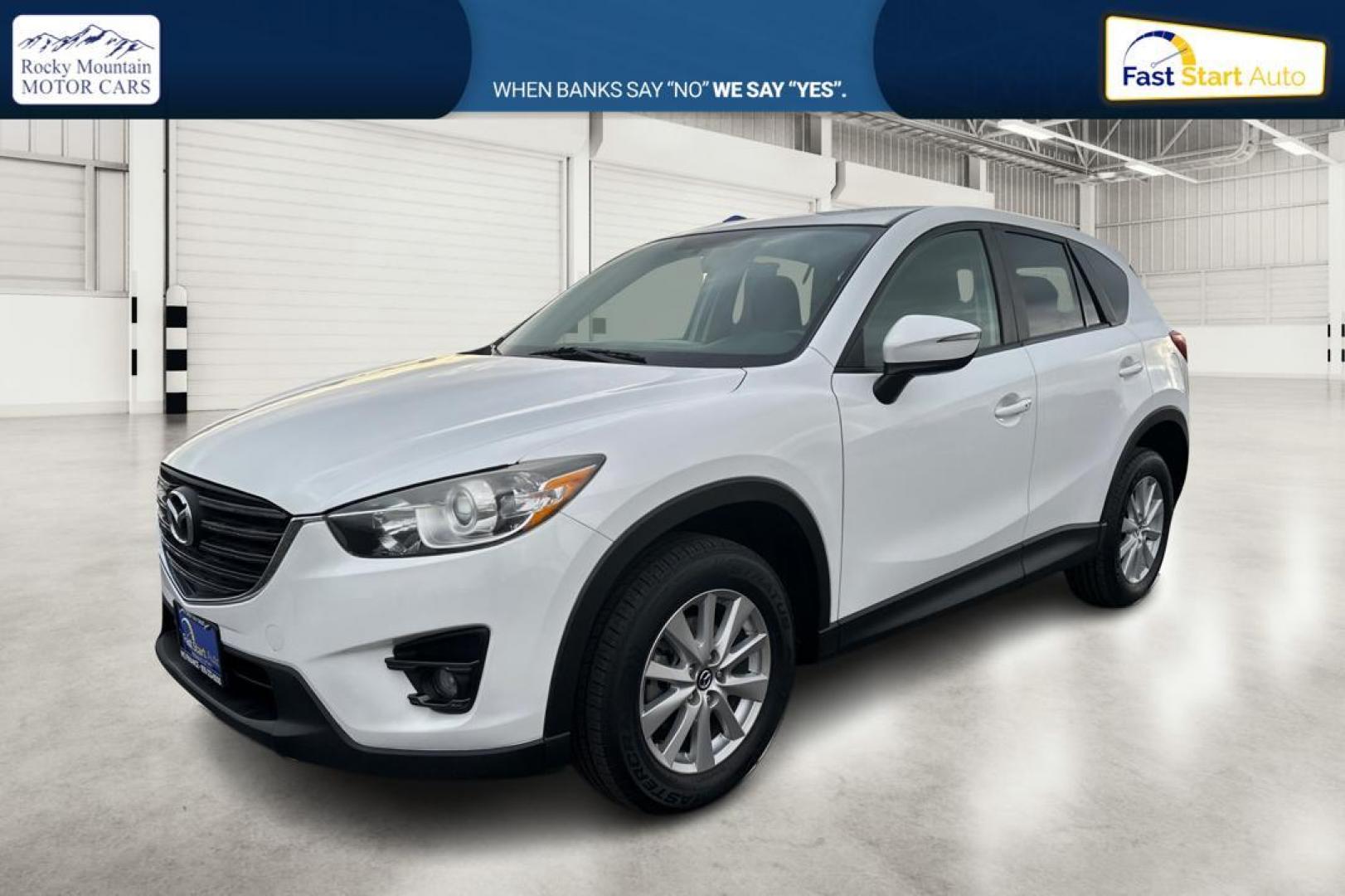 2016 White Mazda CX-5 Touring (JM3KE2CY5G0) with an 2.5L L4 DOHC 16V engine, 6-Speed Automatic transmission, located at 767 S State Road, Pleasant Grove, UT, 84062, (801) 785-1058, 40.354839, -111.736687 - Photo#8