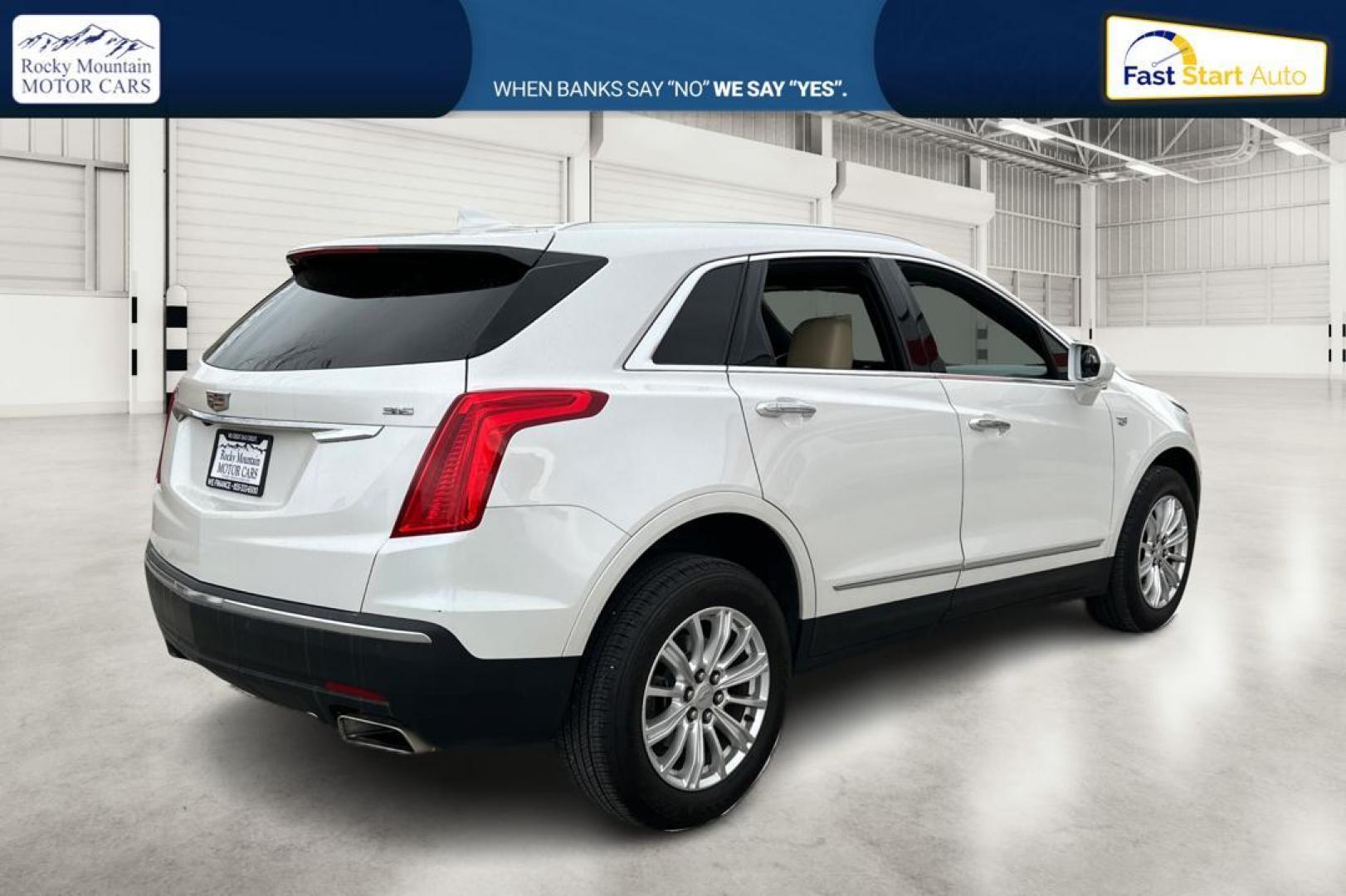 2017 White Cadillac XT5 Base (1GYKNARS9HZ) with an 3.6L V6 DOHC 24V engine, 8A transmission, located at 767 S State Road, Pleasant Grove, UT, 84062, (801) 785-1058, 40.354839, -111.736687 - Photo#2