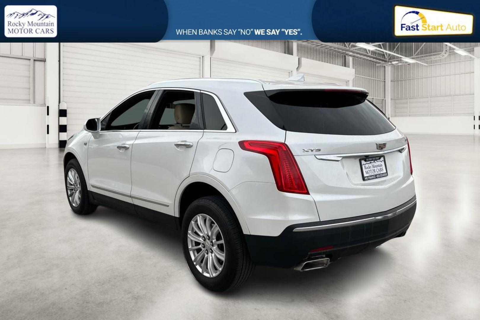 2017 White Cadillac XT5 Base (1GYKNARS9HZ) with an 3.6L V6 DOHC 24V engine, 8A transmission, located at 767 S State Road, Pleasant Grove, UT, 84062, (801) 785-1058, 40.354839, -111.736687 - Photo#5