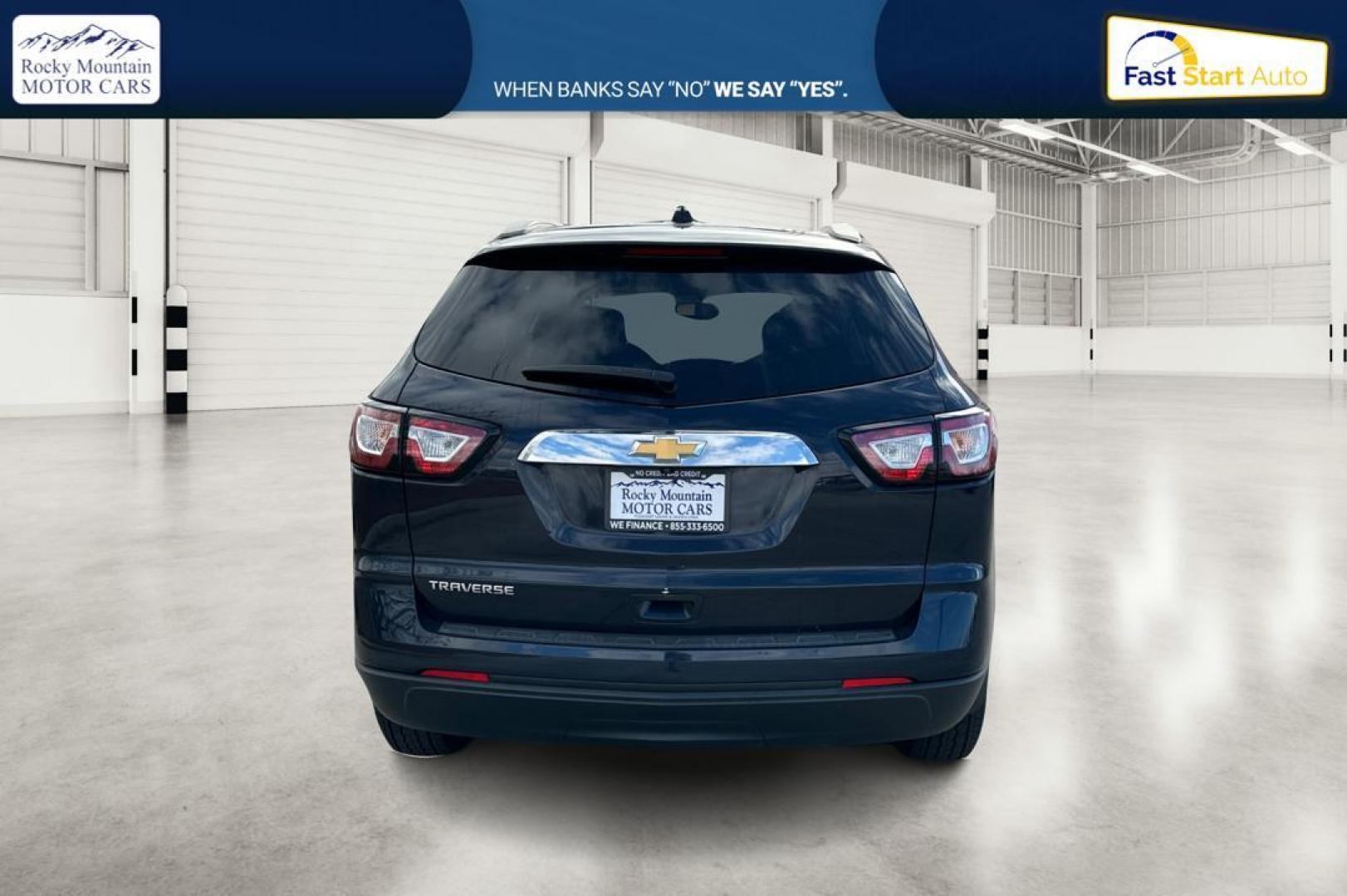 2017 Blue Chevrolet Traverse LS FWD (1GNKRFKD3HJ) with an 3.6L V6 DOHC 24V engine, 6A transmission, located at 767 S State Road, Pleasant Grove, UT, 84062, (801) 785-1058, 40.354839, -111.736687 - Photo#4