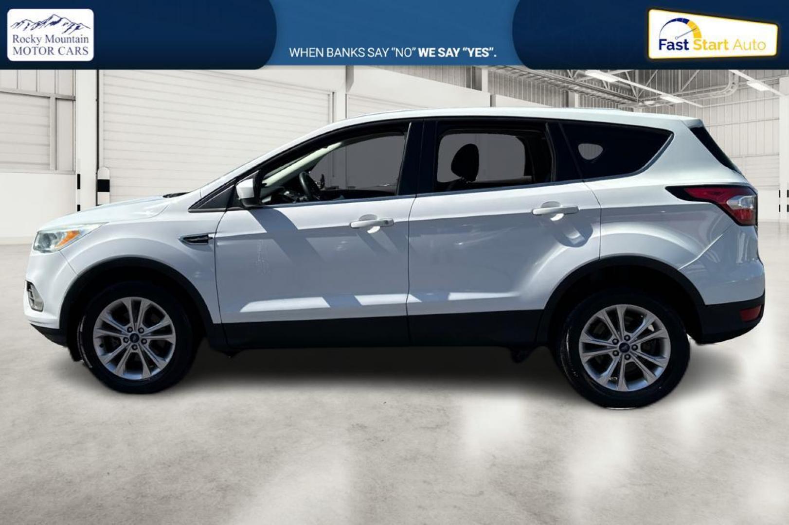 2017 White Ford Escape SE FWD (1FMCU0GDXHU) with an 1.5L L4 DOHC 16V engine, 6A transmission, located at 767 S State Road, Pleasant Grove, UT, 84062, (801) 785-1058, 40.354839, -111.736687 - Photo#5