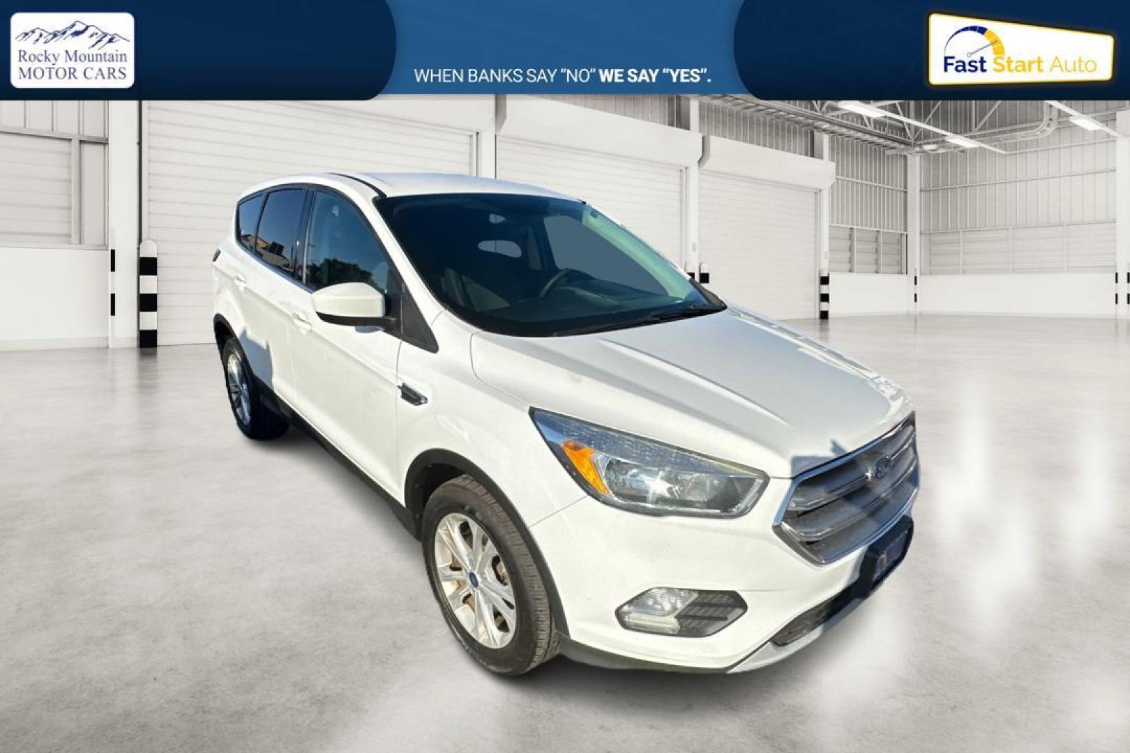 2017 White Ford Escape SE 4WD (1FMCU9GD3HU) with an 1.5L L4 DOHC 16V engine, 6A transmission, located at 7755 State Street, Midvale, UT, 84047, (801) 753-9063, 40.610329, -111.892159 - Photo#0