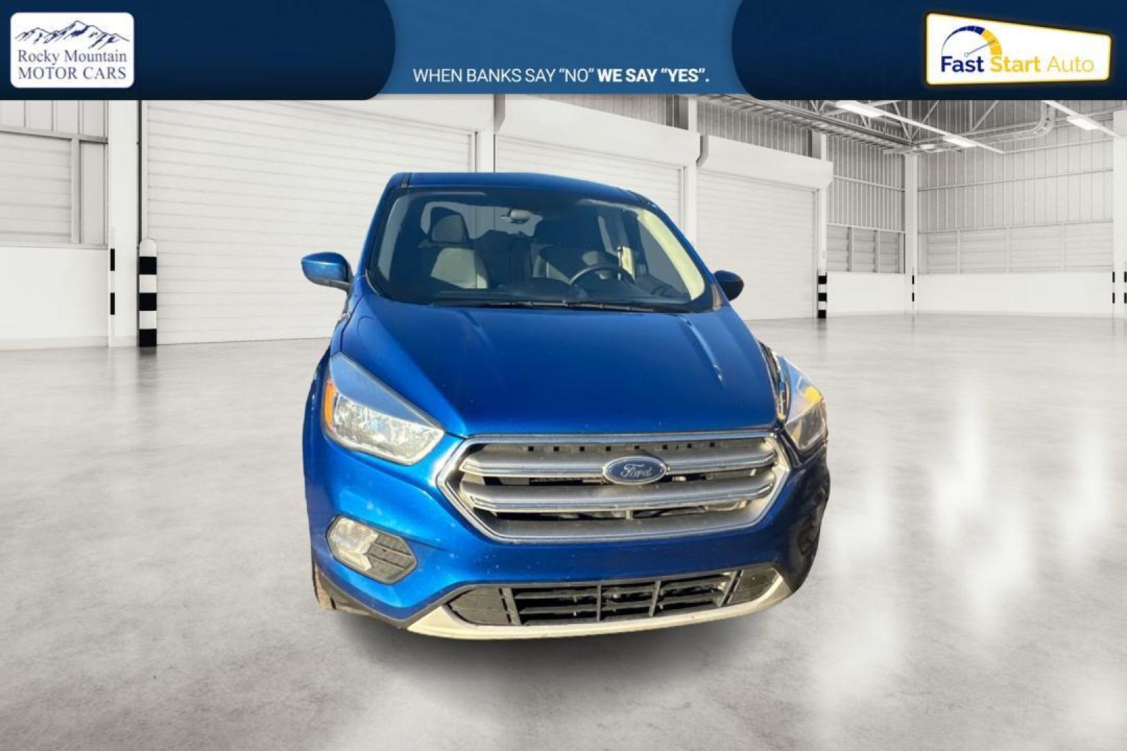 2017 Blue Ford Escape SE FWD (1FMCU0GD9HU) with an 1.5L L4 DOHC 16V engine, 6A transmission, located at 7755 State Street, Midvale, UT, 84047, (801) 753-9063, 40.610329, -111.892159 - Photo#0