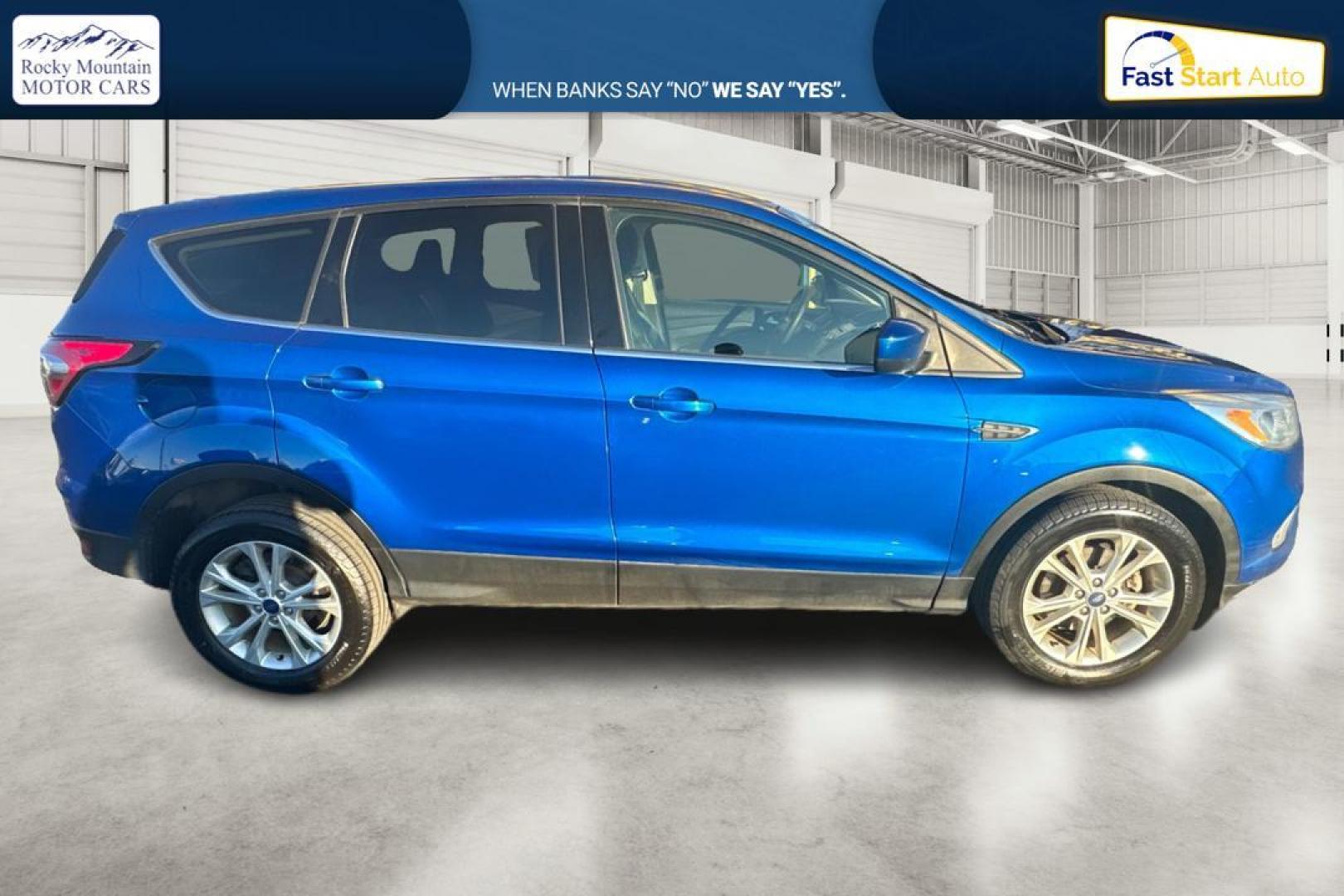 2017 Blue Ford Escape SE FWD (1FMCU0GD9HU) with an 1.5L L4 DOHC 16V engine, 6A transmission, located at 7755 State Street, Midvale, UT, 84047, (801) 753-9063, 40.610329, -111.892159 - Photo#1