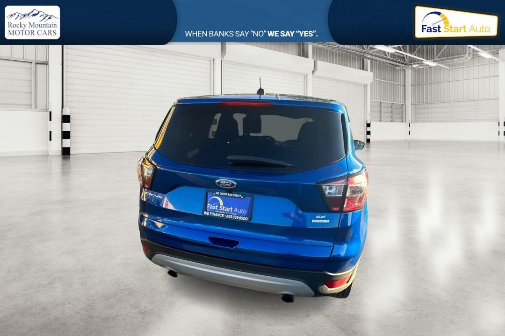 2017 Blue Ford Escape SE FWD (1FMCU0GD9HU) with an 1.5L L4 DOHC 16V engine, 6A transmission, located at 7755 State Street, Midvale, UT, 84047, (801) 753-9063, 40.610329, -111.892159 - Photo#3