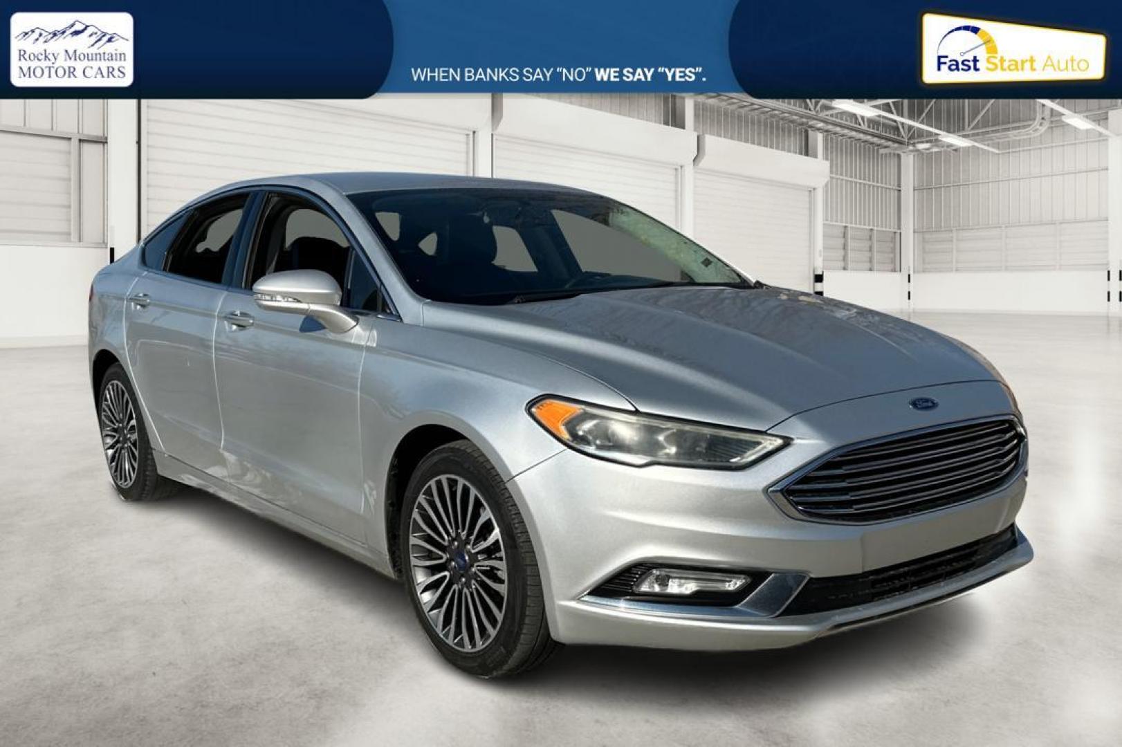 2017 Silver Ford Fusion Titanium (3FA6P0K93HR) with an 2.0L L4 DOHC 16V engine, 6A transmission, located at 7755 State Street, Midvale, UT, 84047, (801) 753-9063, 40.610329, -111.892159 - Photo#0