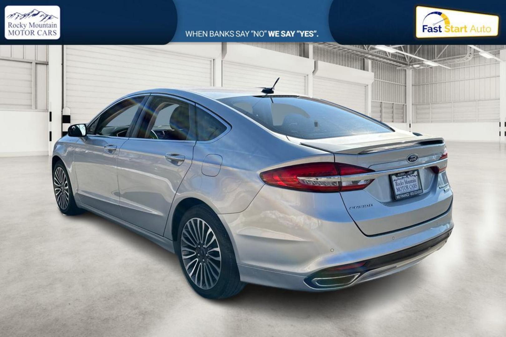 2017 Silver Ford Fusion Titanium (3FA6P0K93HR) with an 2.0L L4 DOHC 16V engine, 6A transmission, located at 7755 State Street, Midvale, UT, 84047, (801) 753-9063, 40.610329, -111.892159 - Photo#5