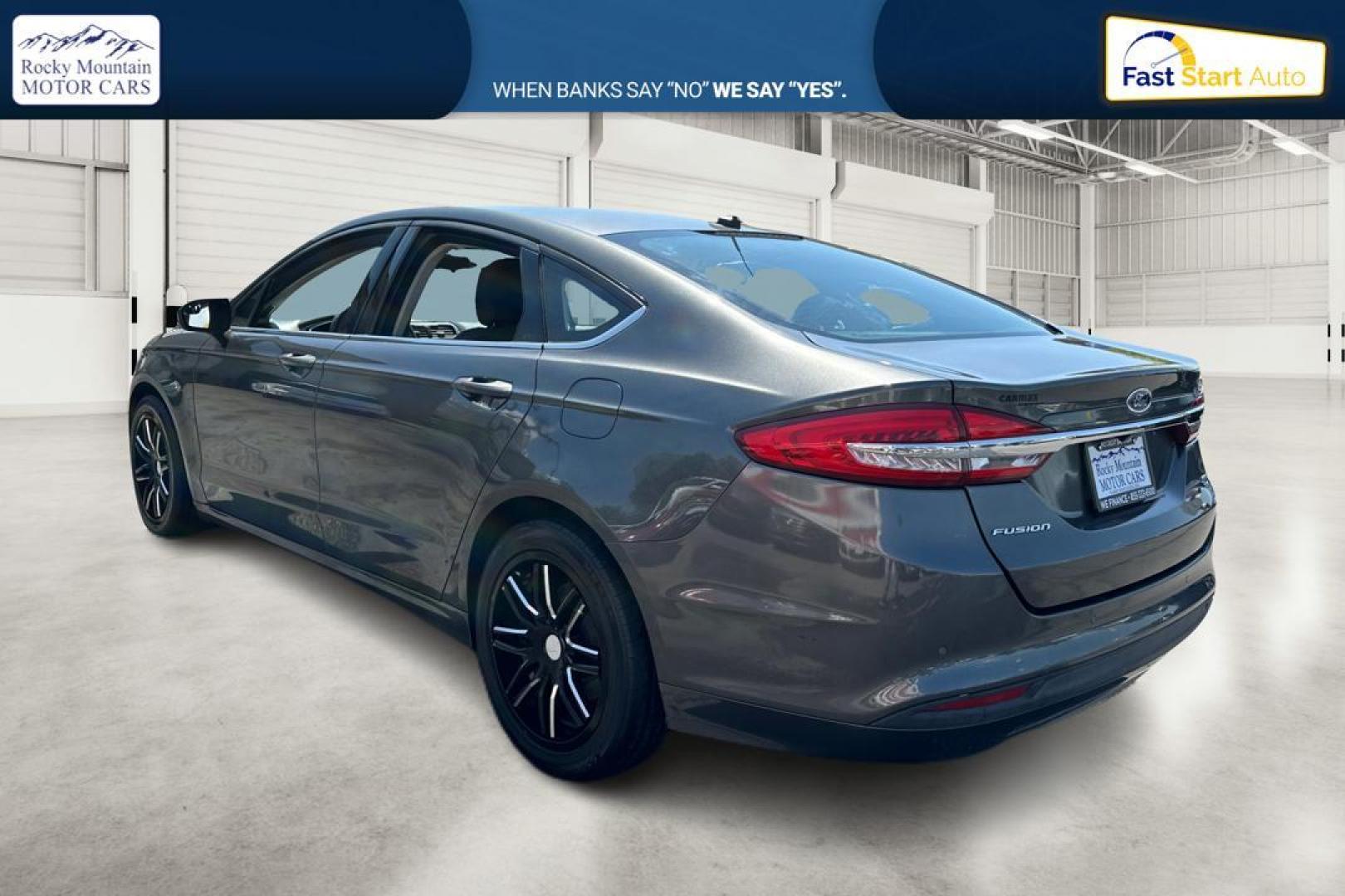 2017 Gray Ford Fusion SE (3FA6P0H76HR) with an 2.5L L4 DOHC 16V engine, 6A transmission, located at 7755 State Street, Midvale, UT, 84047, (801) 753-9063, 40.610329, -111.892159 - Photo#4