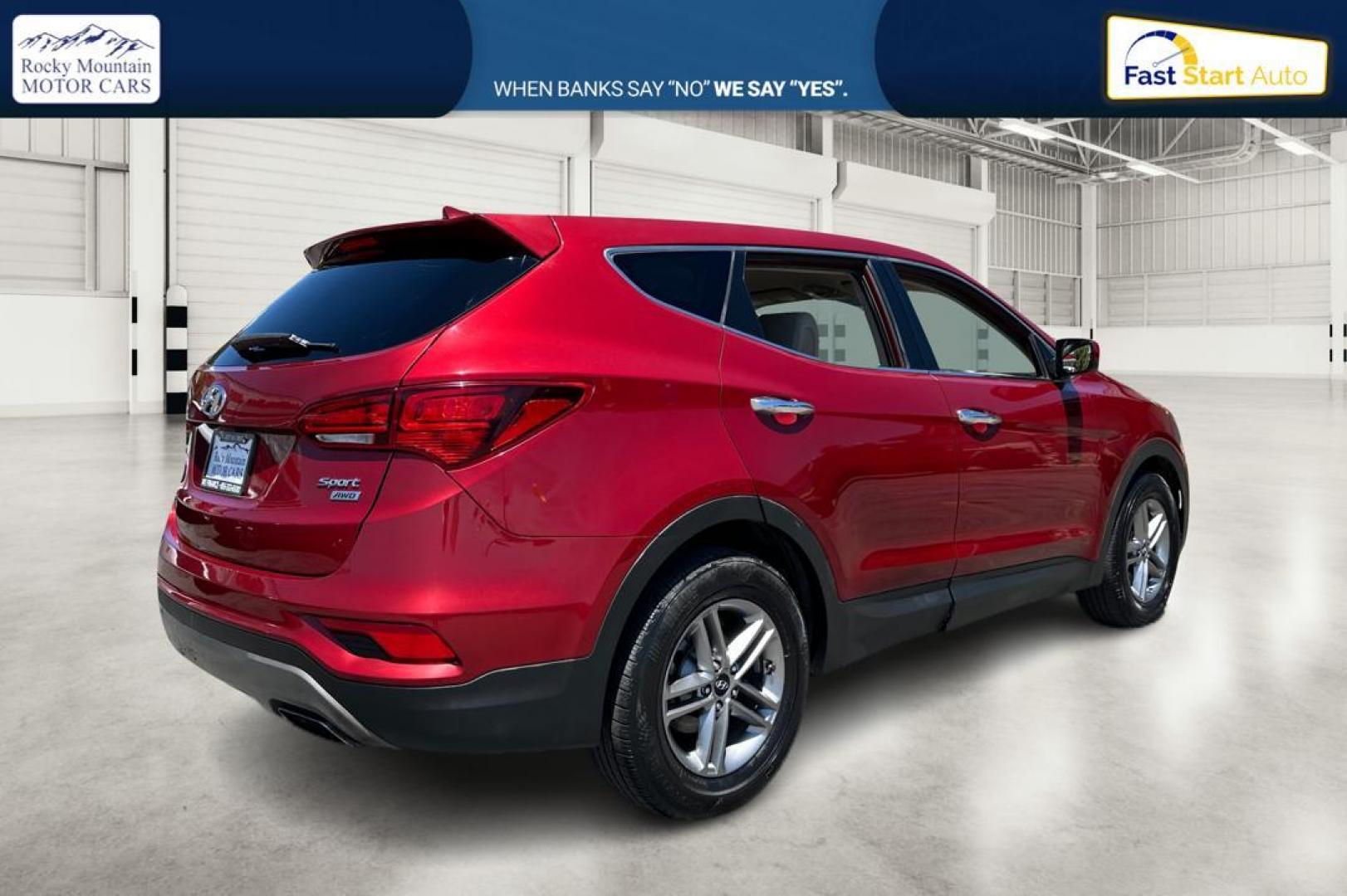 2017 Red Hyundai Santa Fe Sport 2.4 AWD (5XYZTDLB5HG) with an 2.4L L4 DOHC 16V engine, 6A transmission, located at 767 S State Road, Pleasant Grove, UT, 84062, (801) 785-1058, 40.354839, -111.736687 - Photo#2