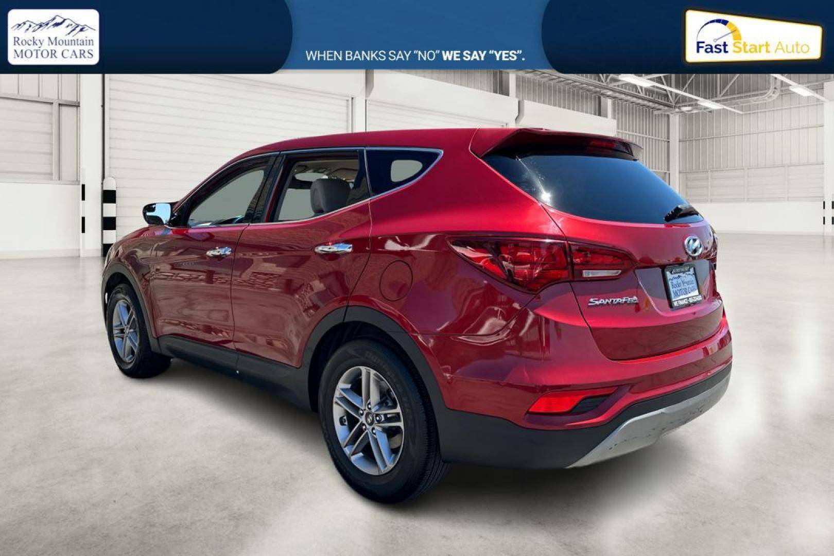 2017 Red Hyundai Santa Fe Sport 2.4 AWD (5XYZTDLB5HG) with an 2.4L L4 DOHC 16V engine, 6A transmission, located at 767 S State Road, Pleasant Grove, UT, 84062, (801) 785-1058, 40.354839, -111.736687 - Photo#4