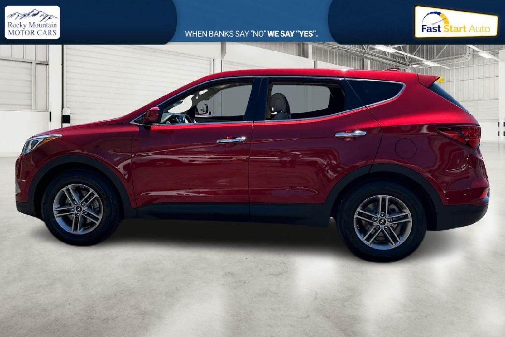 2017 Red Hyundai Santa Fe Sport 2.4 AWD (5XYZTDLB5HG) with an 2.4L L4 DOHC 16V engine, 6A transmission, located at 767 S State Road, Pleasant Grove, UT, 84062, (801) 785-1058, 40.354839, -111.736687 - Photo#5