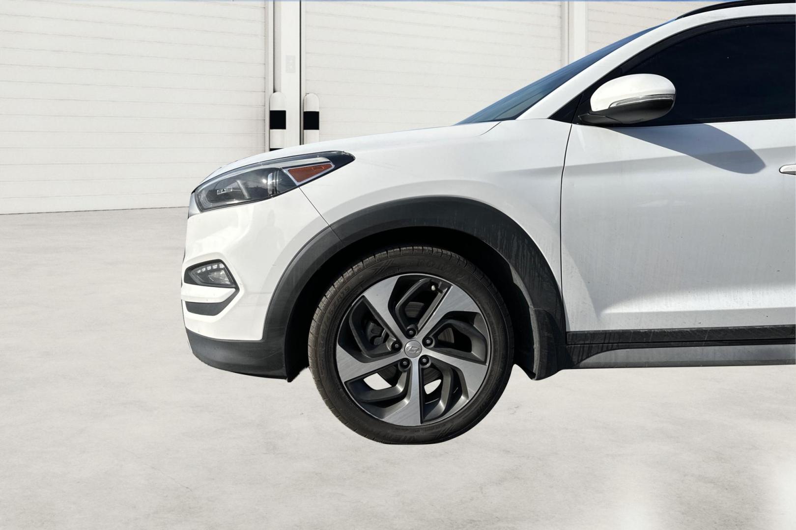 2017 White Hyundai Tucson Eco (KM8J33A21HU) with an 1.6L L4 DOHC 16V engine, 7A transmission, located at 344 S Washington Blvd, Ogden, UT, 84404, (801) 399-1799, 41.255482, -111.970848 - Photo#12