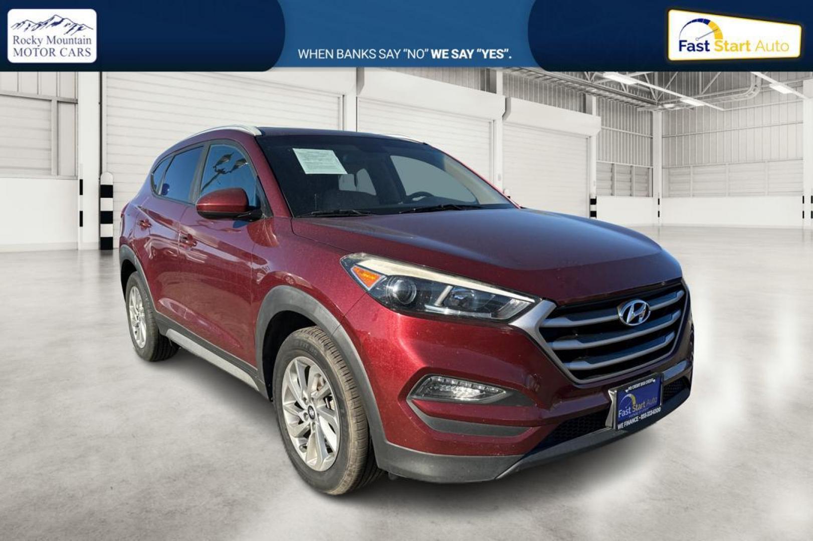 2017 Red Hyundai Tucson SE w/Preferred Package (KM8J33A46HU) with an 2.0L L4 DOHC 16V engine, 6A transmission, located at 344 S Washington Blvd, Ogden, UT, 84404, (801) 399-1799, 41.255482, -111.970848 - Photo#0