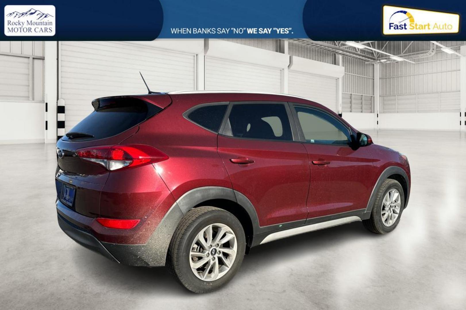 2017 Red Hyundai Tucson SE w/Preferred Package (KM8J33A46HU) with an 2.0L L4 DOHC 16V engine, 6A transmission, located at 344 S Washington Blvd, Ogden, UT, 84404, (801) 399-1799, 41.255482, -111.970848 - Photo#2