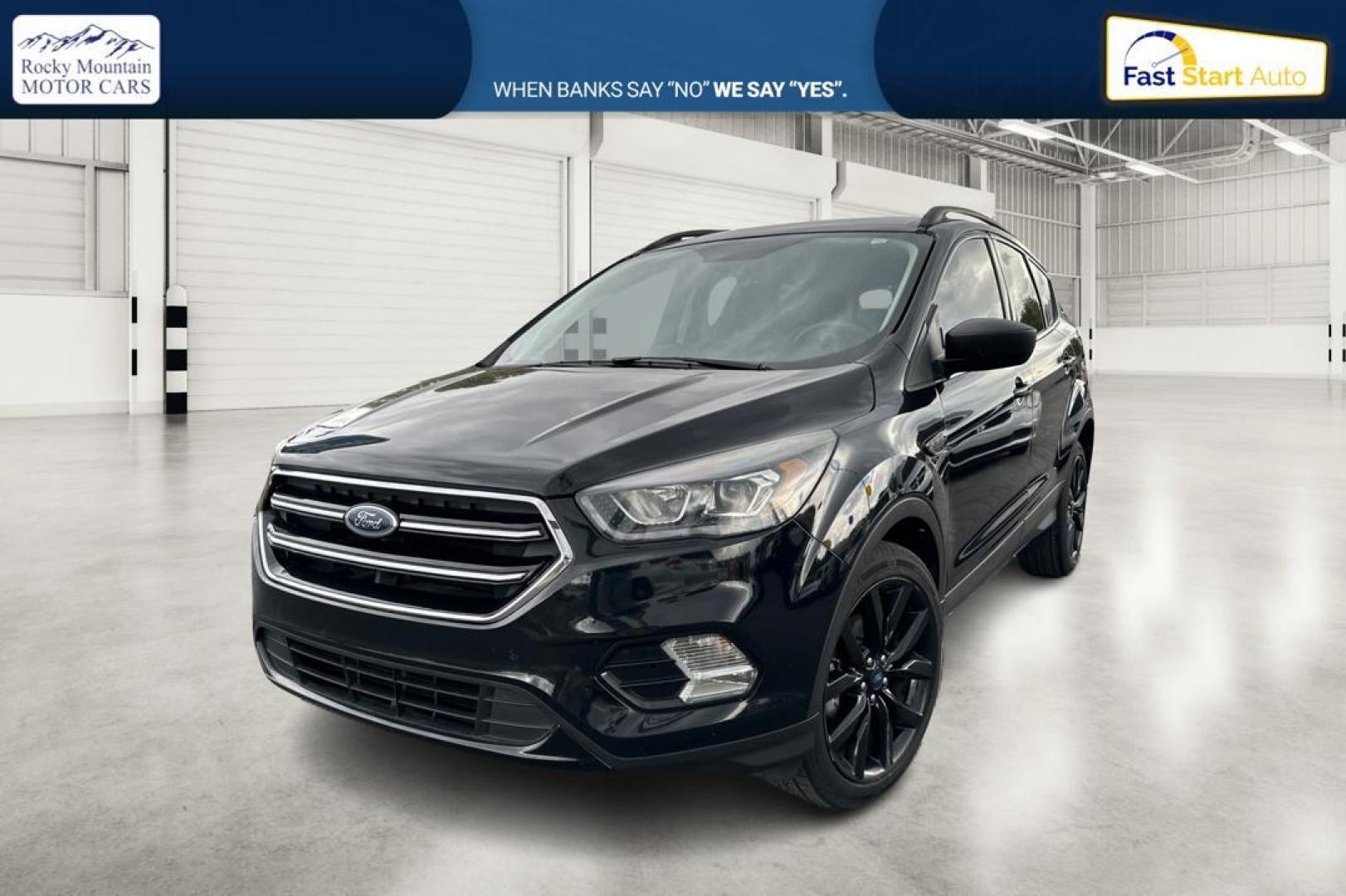 2018 Black Ford Escape SE FWD (1FMCU0GD9JU) with an 1.5L L4 DOHC 16V engine, 6A transmission, located at 7755 State Street, Midvale, UT, 84047, (801) 753-9063, 40.610329, -111.892159 - Photo#6