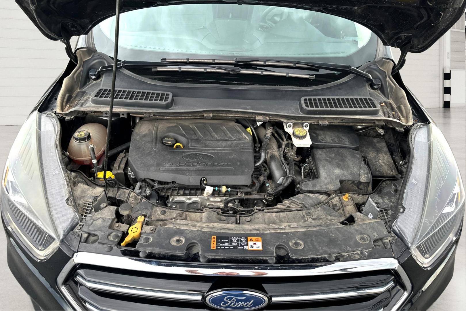 2018 Black Ford Escape SE FWD (1FMCU0GD9JU) with an 1.5L L4 DOHC 16V engine, 6A transmission, located at 7755 State Street, Midvale, UT, 84047, (801) 753-9063, 40.610329, -111.892159 - Photo#8