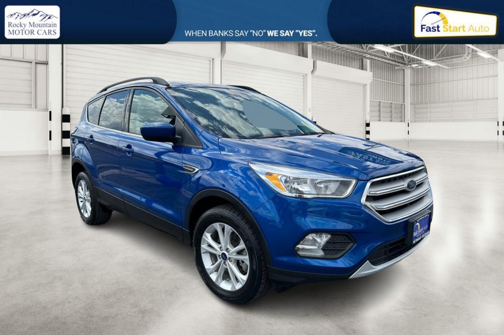 2018 Blue Ford Escape SE 4WD (1FMCU9GD0JU) with an 1.5L L4 DOHC 16V engine, 6A transmission, located at 7755 State Street, Midvale, UT, 84047, (801) 753-9063, 40.610329, -111.892159 - Photo#0