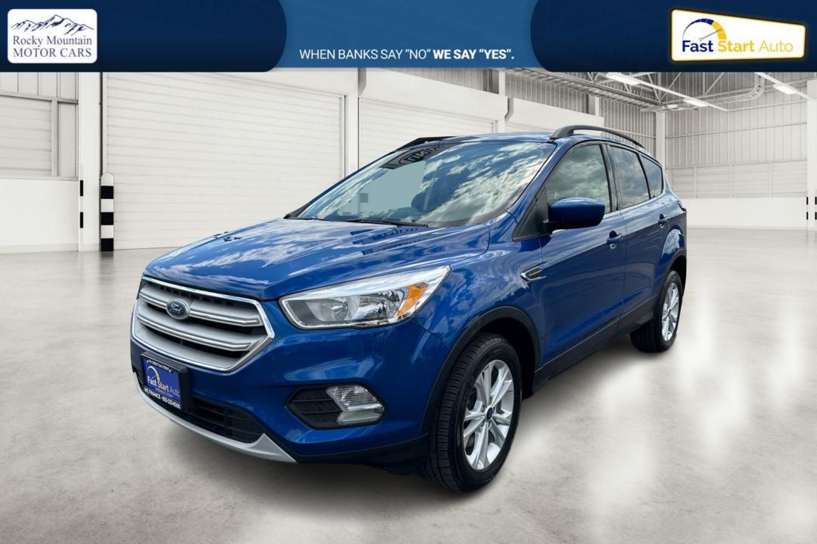 2018 Blue Ford Escape SE 4WD (1FMCU9GD0JU) with an 1.5L L4 DOHC 16V engine, 6A transmission, located at 7755 State Street, Midvale, UT, 84047, (801) 753-9063, 40.610329, -111.892159 - Photo#6