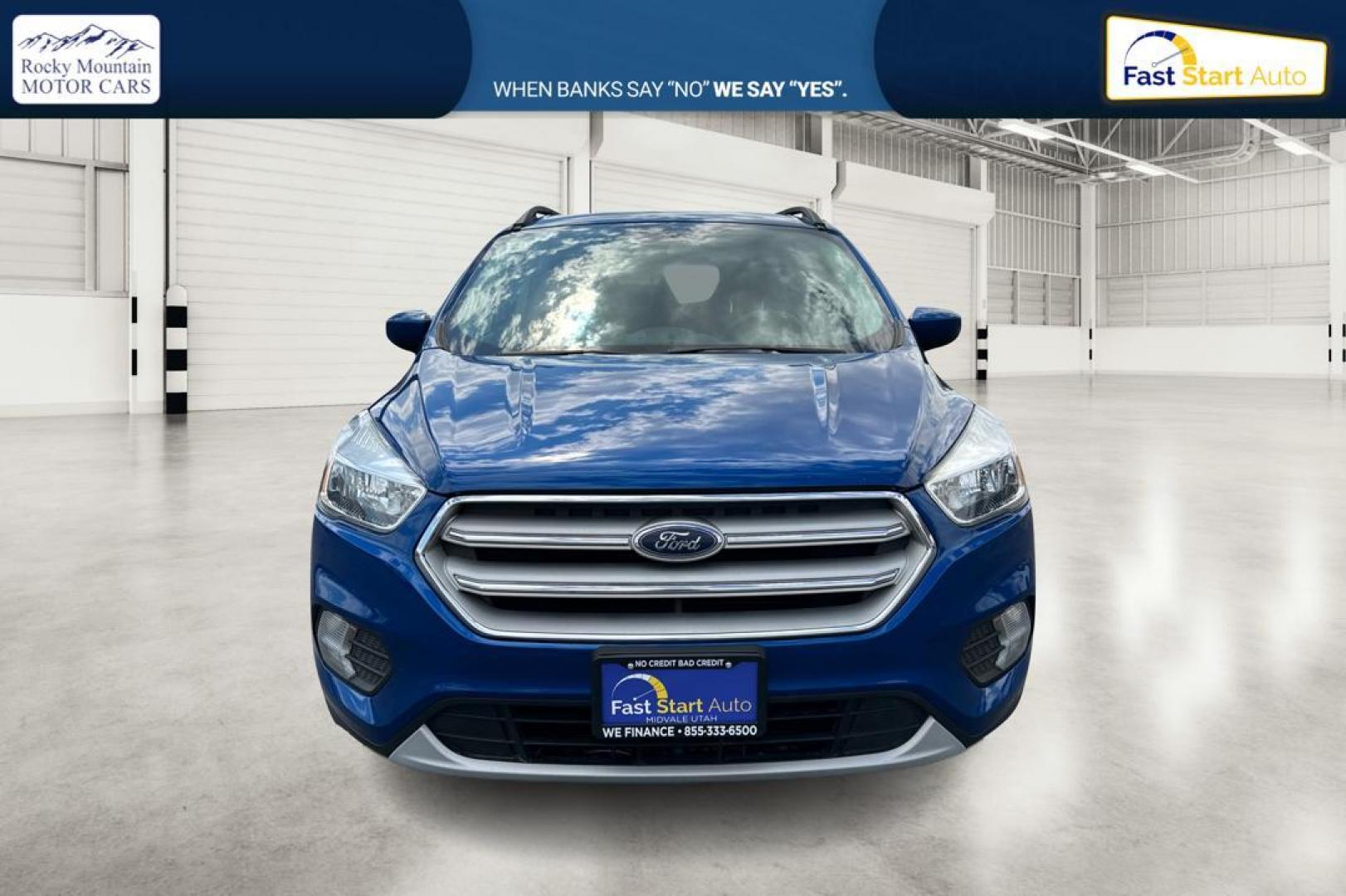 2018 Blue Ford Escape SE 4WD (1FMCU9GD0JU) with an 1.5L L4 DOHC 16V engine, 6A transmission, located at 7755 State Street, Midvale, UT, 84047, (801) 753-9063, 40.610329, -111.892159 - Photo#7