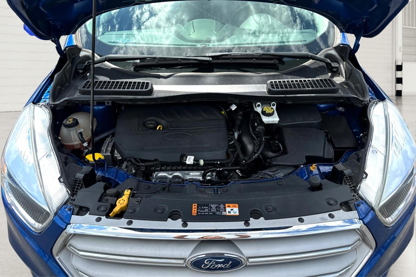 2018 Blue Ford Escape SE 4WD (1FMCU9GD0JU) with an 1.5L L4 DOHC 16V engine, 6A transmission, located at 7755 State Street, Midvale, UT, 84047, (801) 753-9063, 40.610329, -111.892159 - Photo#8