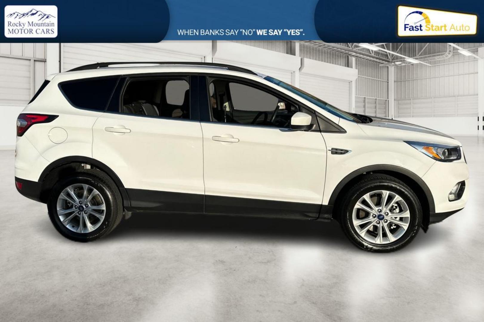 2018 White Ford Escape SE FWD (1FMCU0G92JU) with an 2.0L L4 DOHC 16V engine, 6A transmission, located at 7755 State Street, Midvale, UT, 84047, (801) 753-9063, 40.610329, -111.892159 - Photo#1