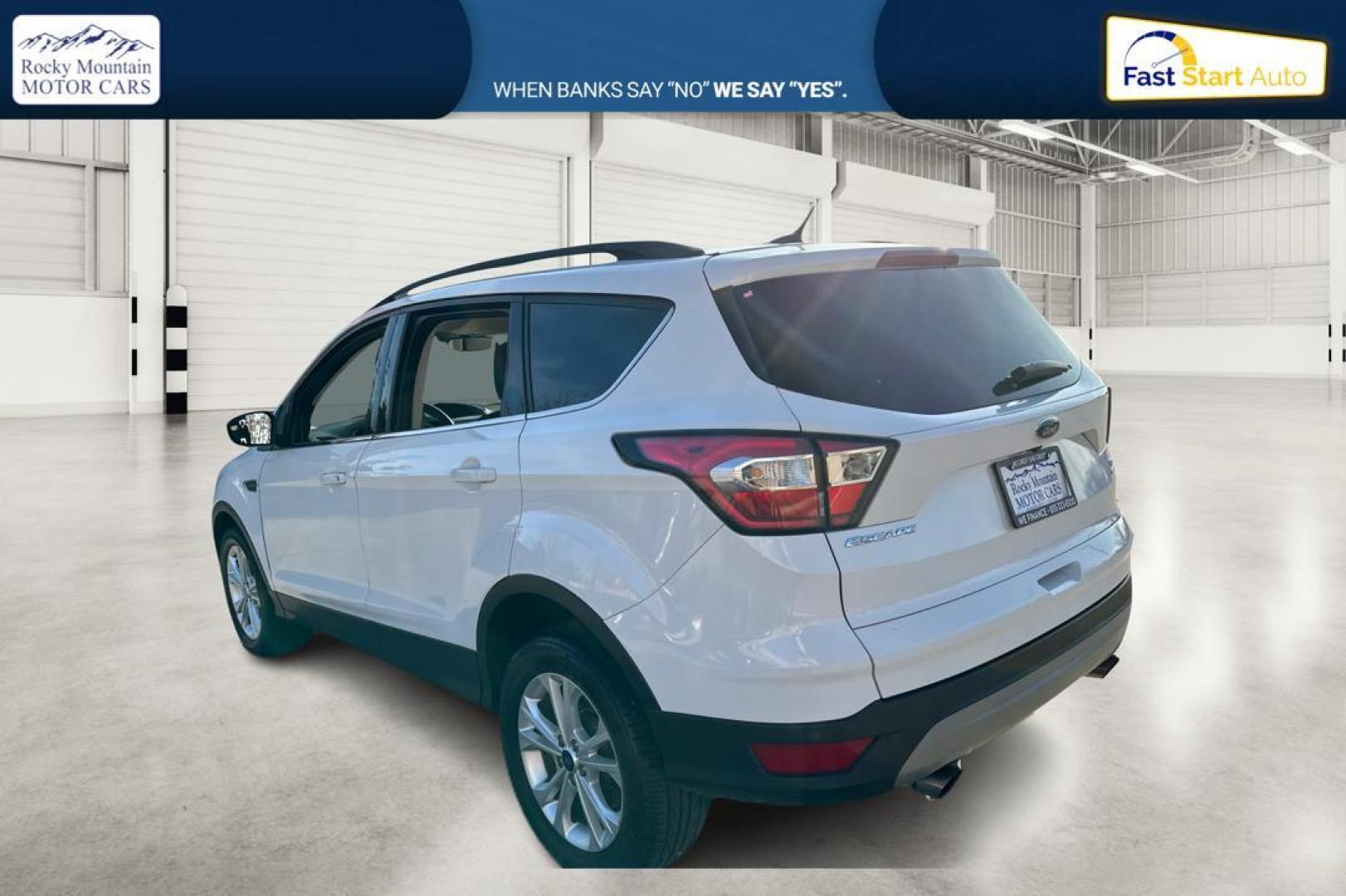 2018 White Ford Escape SE FWD (1FMCU0G92JU) with an 2.0L L4 DOHC 16V engine, 6A transmission, located at 7755 State Street, Midvale, UT, 84047, (801) 753-9063, 40.610329, -111.892159 - Photo#4