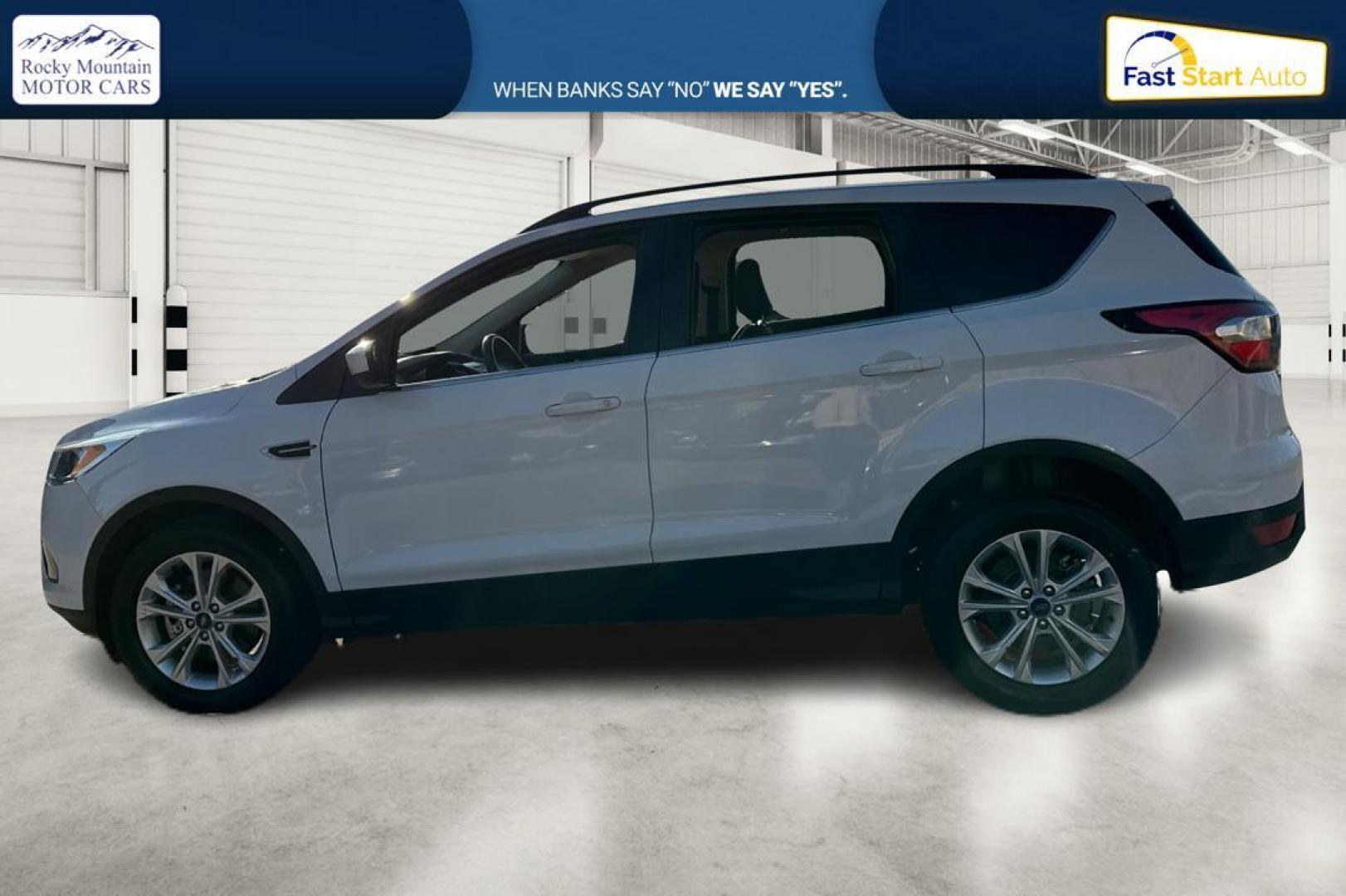 2018 White Ford Escape SE FWD (1FMCU0G92JU) with an 2.0L L4 DOHC 16V engine, 6A transmission, located at 7755 State Street, Midvale, UT, 84047, (801) 753-9063, 40.610329, -111.892159 - Photo#5