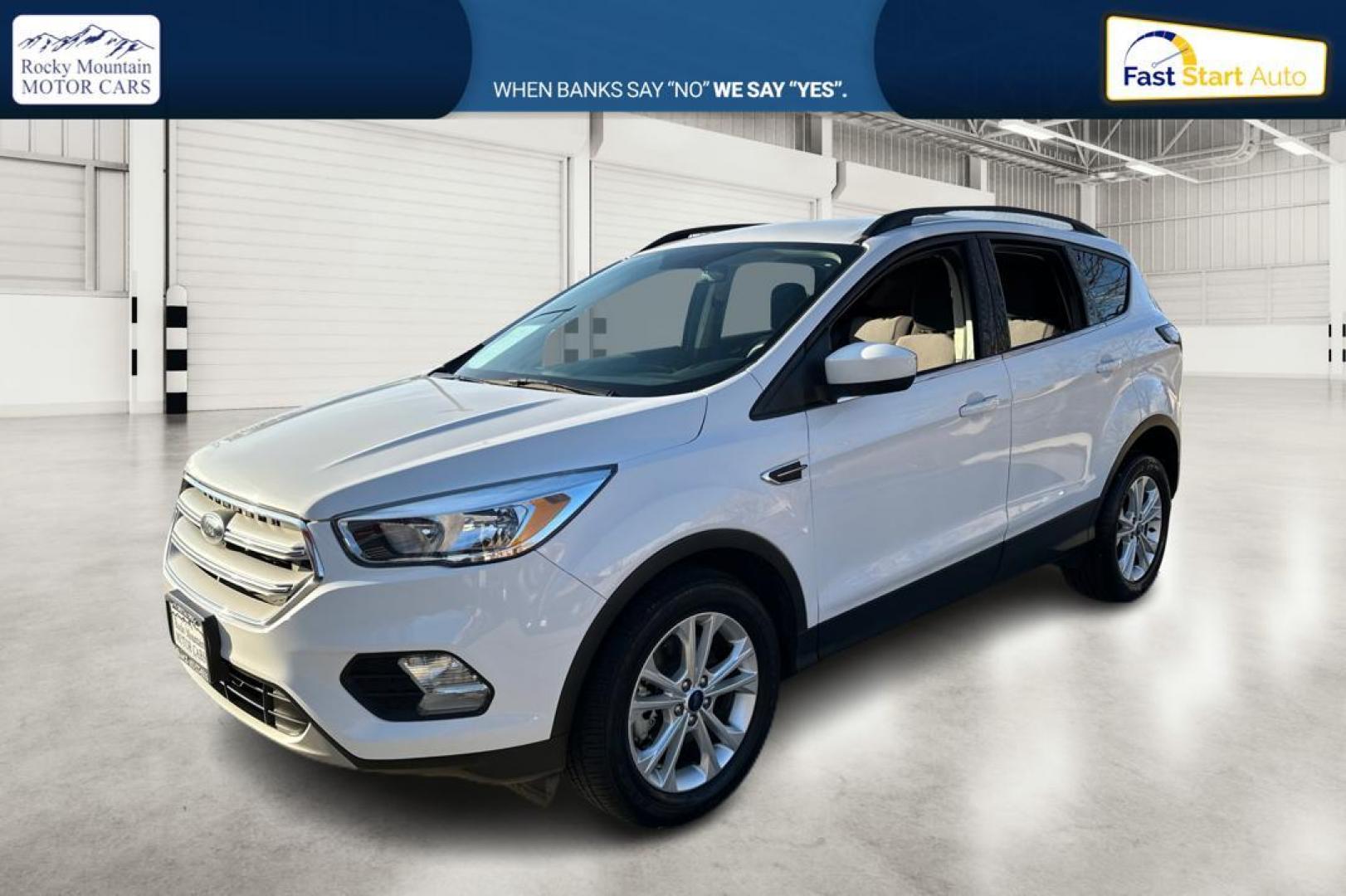 2018 White Ford Escape SE FWD (1FMCU0G92JU) with an 2.0L L4 DOHC 16V engine, 6A transmission, located at 7755 State Street, Midvale, UT, 84047, (801) 753-9063, 40.610329, -111.892159 - Photo#6