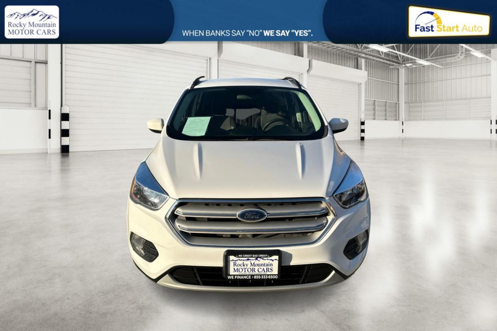 2018 White Ford Escape SE FWD (1FMCU0G92JU) with an 2.0L L4 DOHC 16V engine, 6A transmission, located at 7755 State Street, Midvale, UT, 84047, (801) 753-9063, 40.610329, -111.892159 - Photo#7