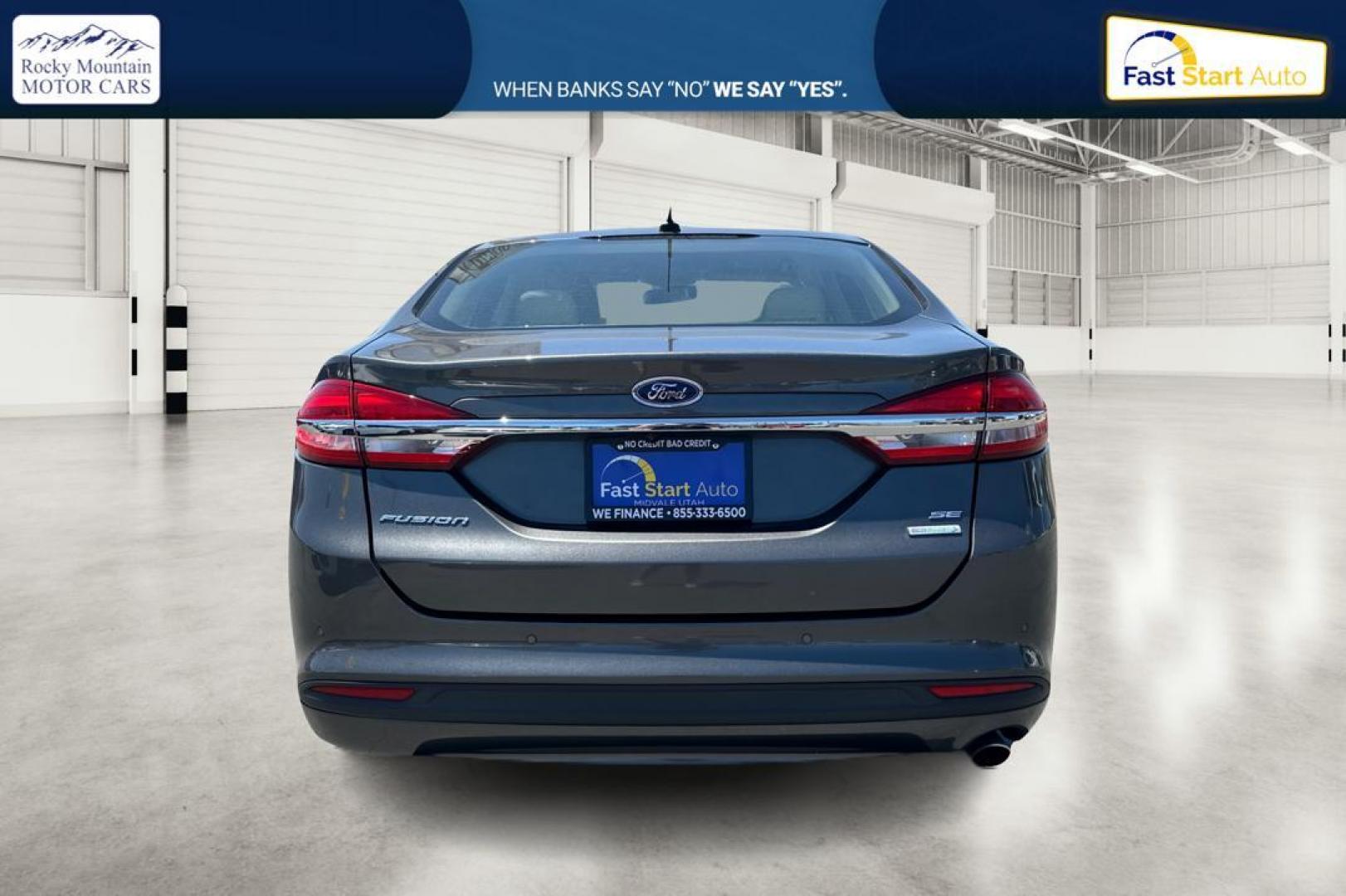 2018 Gray Ford Fusion SE (3FA6P0HD7JR) with an 1.5L L4 DOHC 16V engine, 6A transmission, located at 7755 State Street, Midvale, UT, 84047, (801) 753-9063, 40.610329, -111.892159 - Photo#3