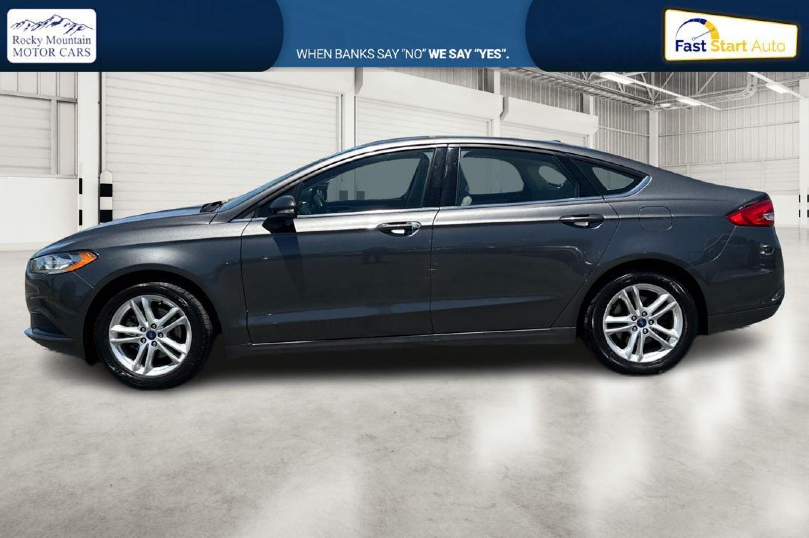 2018 Gray Ford Fusion SE (3FA6P0HD7JR) with an 1.5L L4 DOHC 16V engine, 6A transmission, located at 7755 State Street, Midvale, UT, 84047, (801) 753-9063, 40.610329, -111.892159 - Photo#5